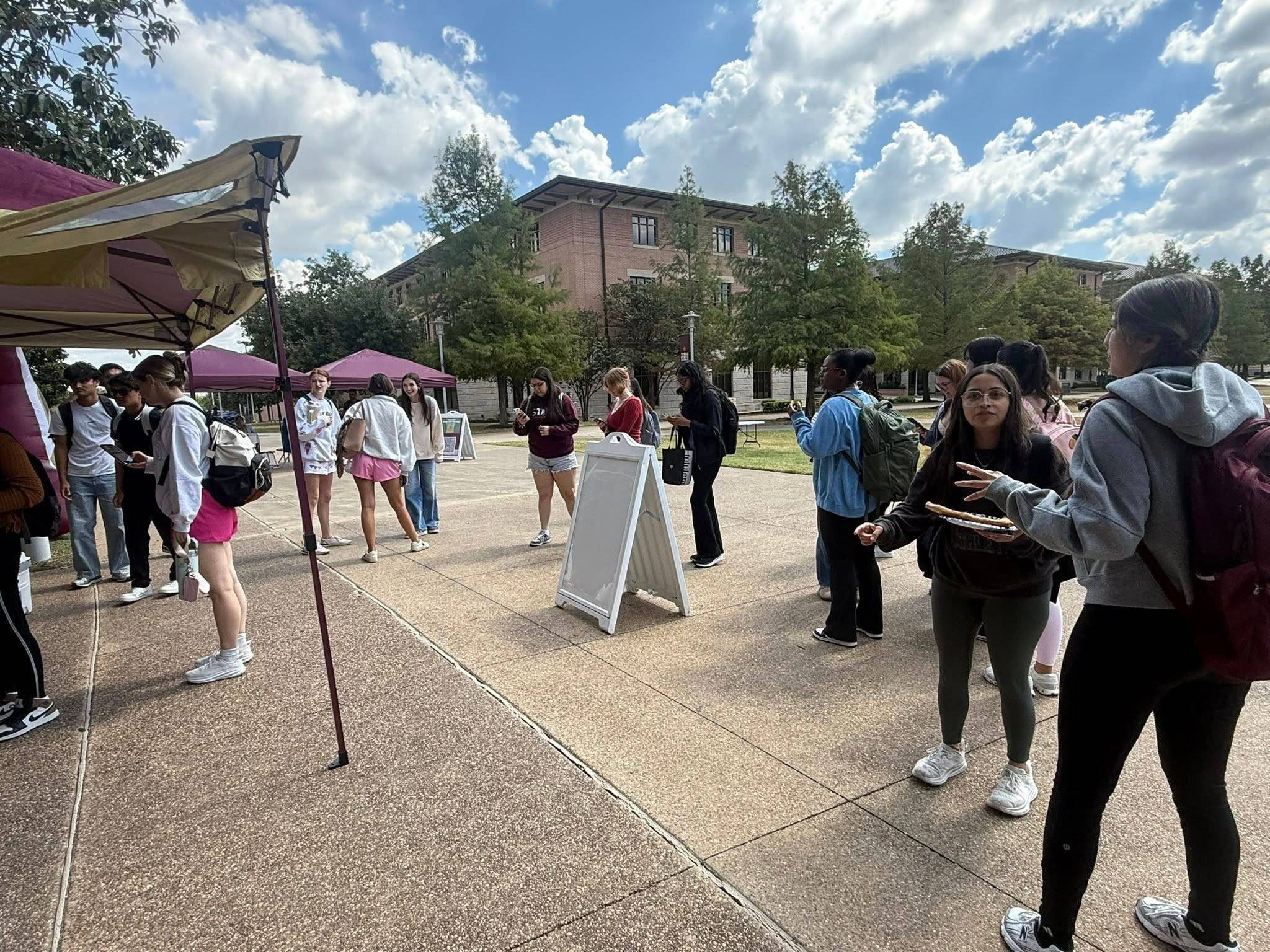 students getting food and goodies