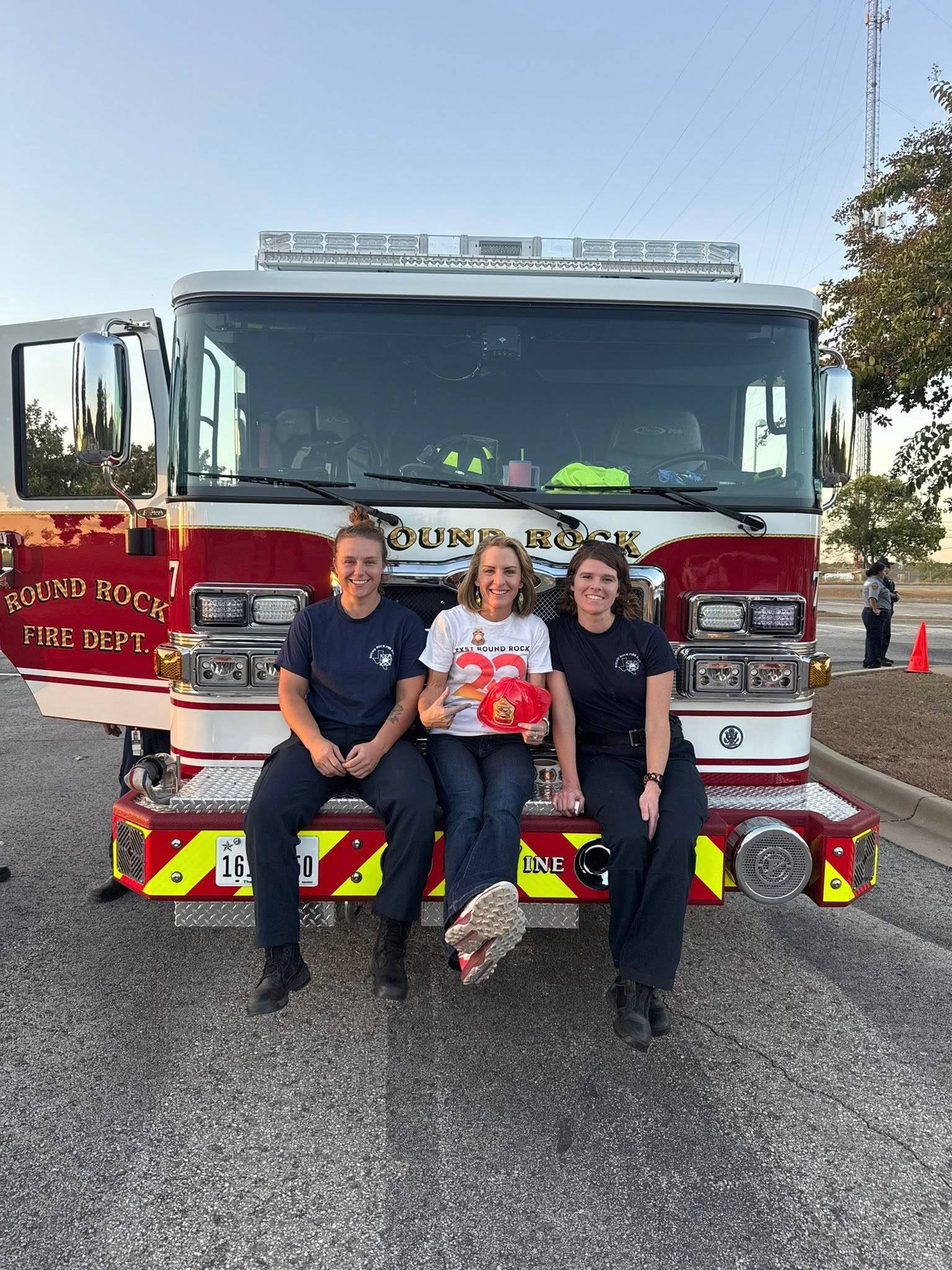 Dr. Lessiter sitting on the Fire Truck