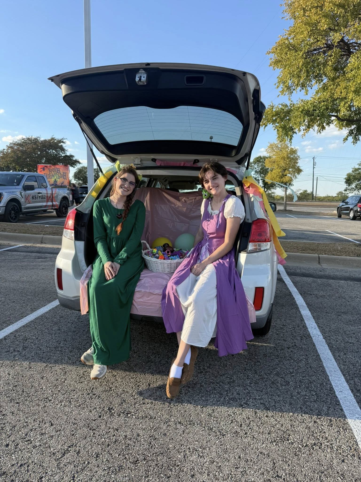 two girls dresses in medieval clothes