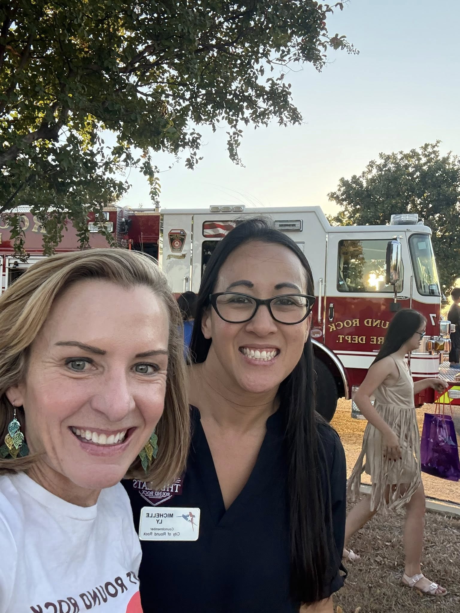 Dr. Lessiter is taking a selfie with the City of Round Rock member