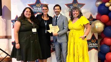TXST Honors College faculty and City of San Marcos representatives pose for a photo.