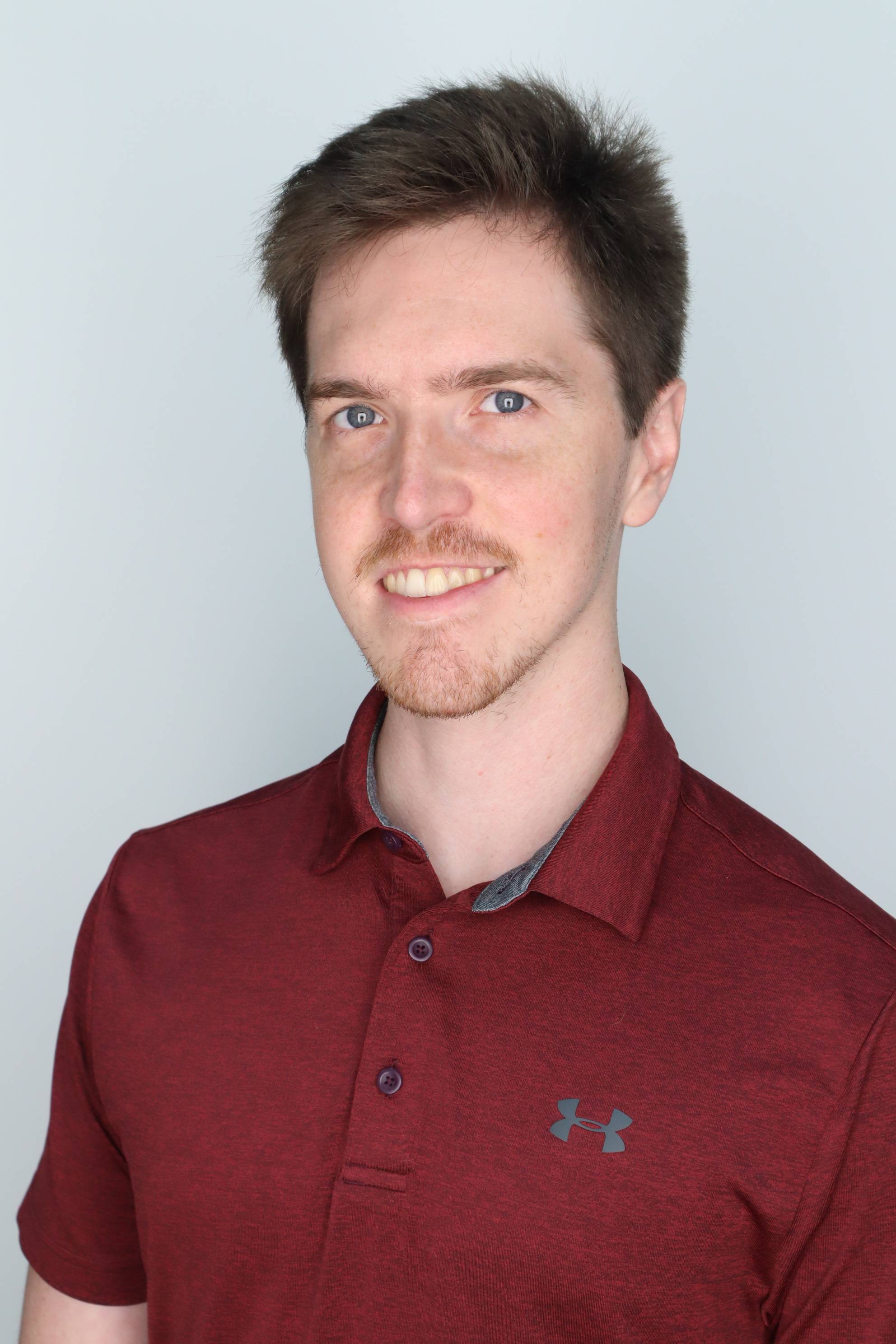 Headshot of Zac Wohlstein