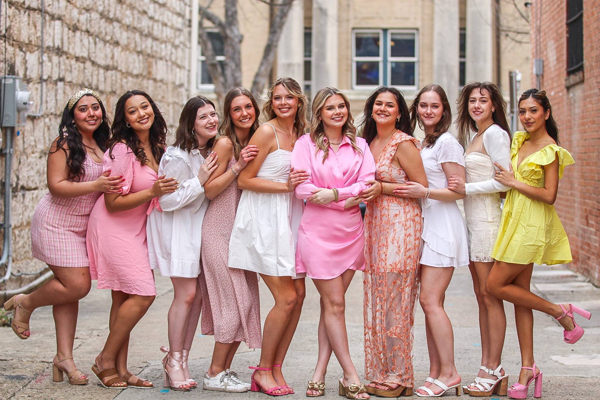 Girls posing on the steps in blue