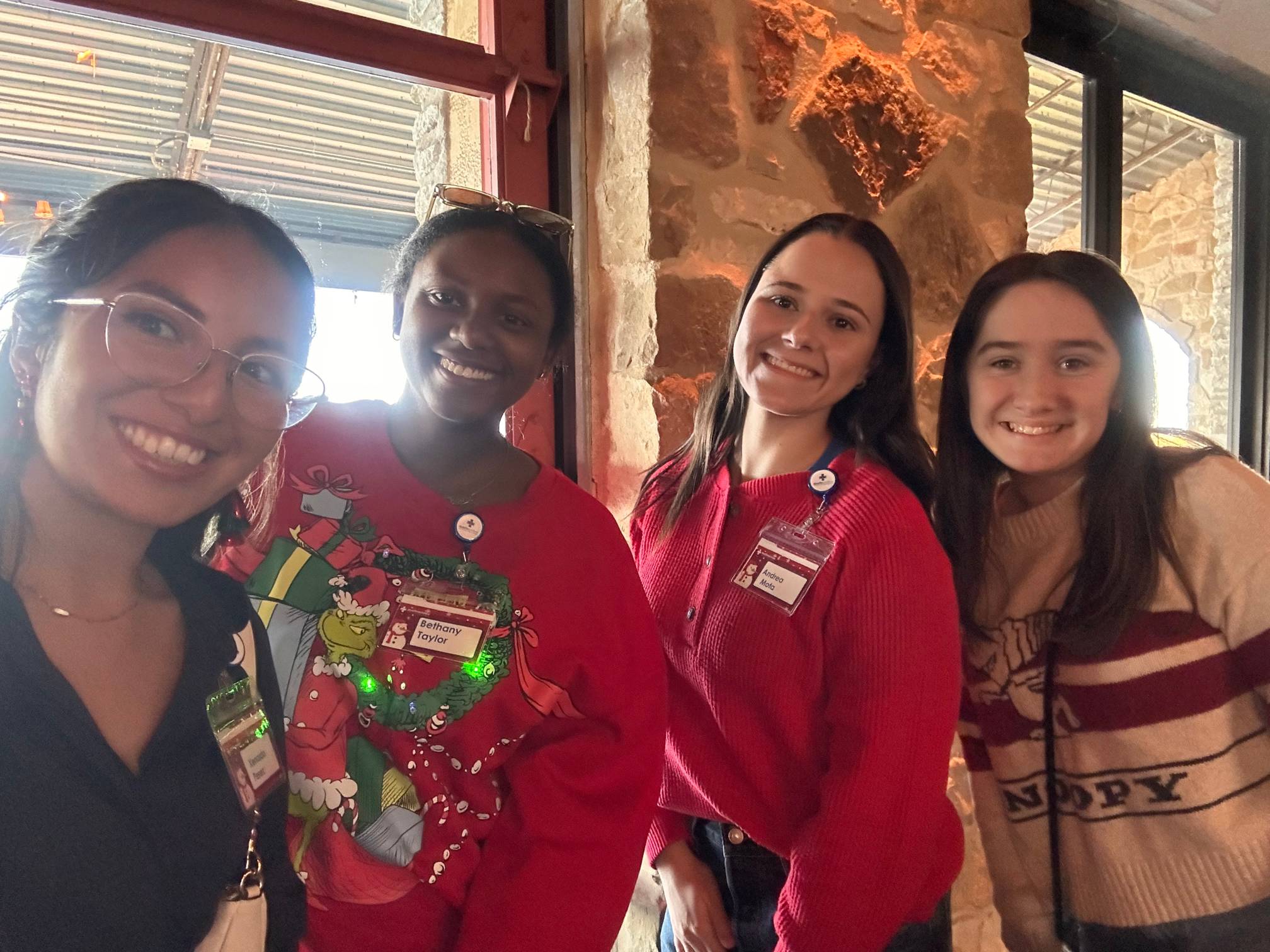 CDIS students enjoying each other's company during their holiday celebration.