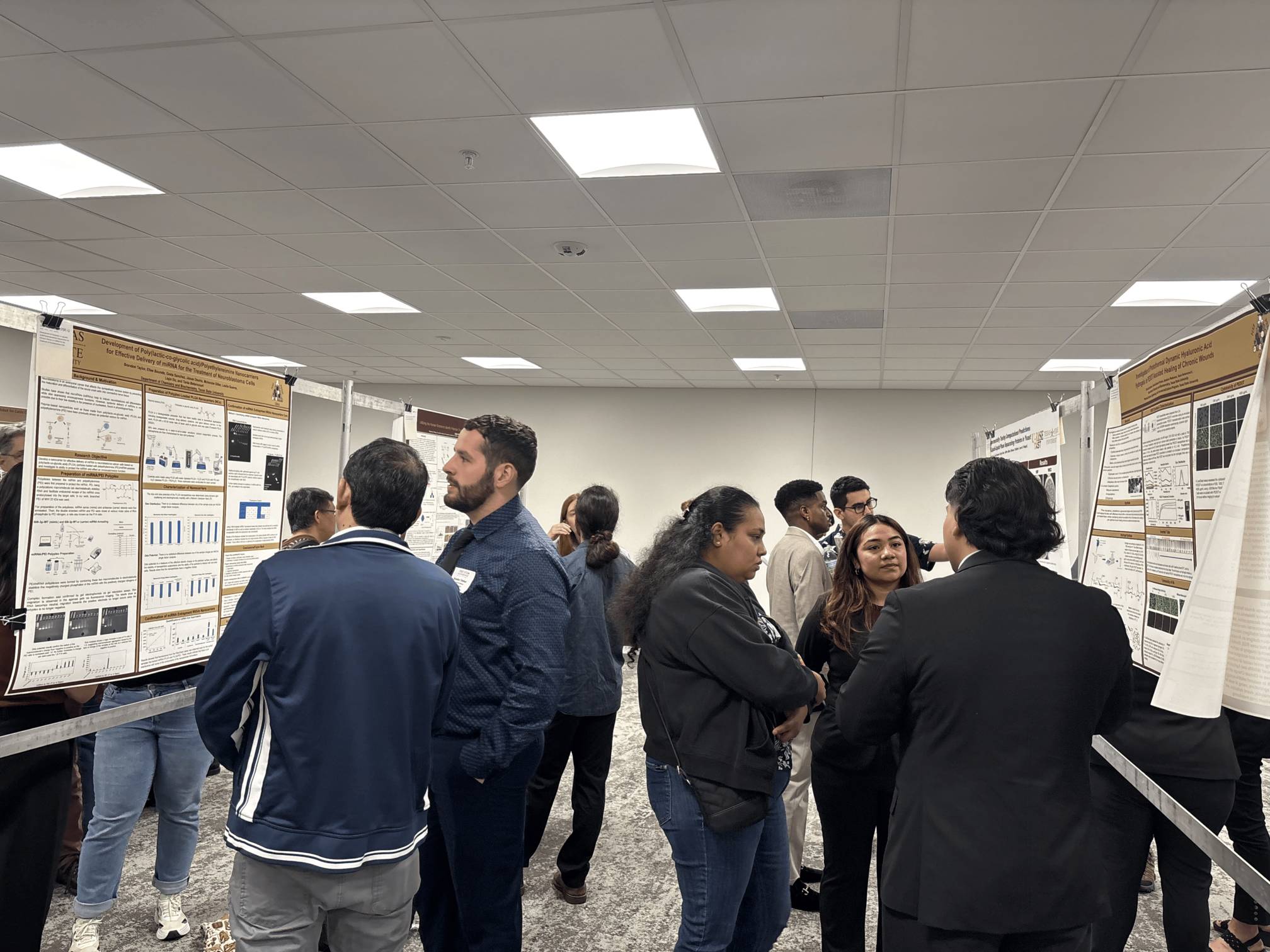 PREM Students Presenting Research Poster