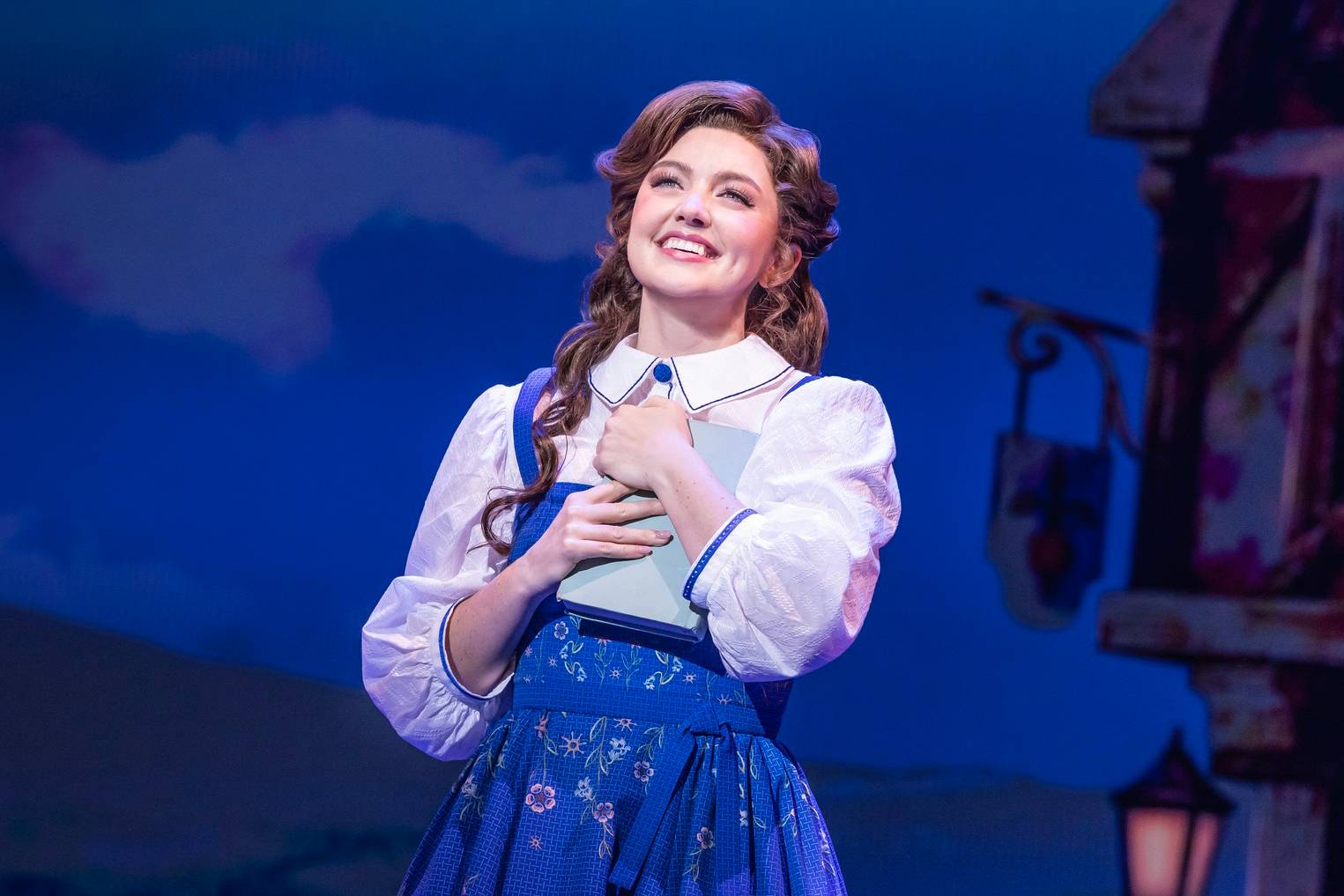 Kyra Belle Johnson as Belle in Beauty and the Beast