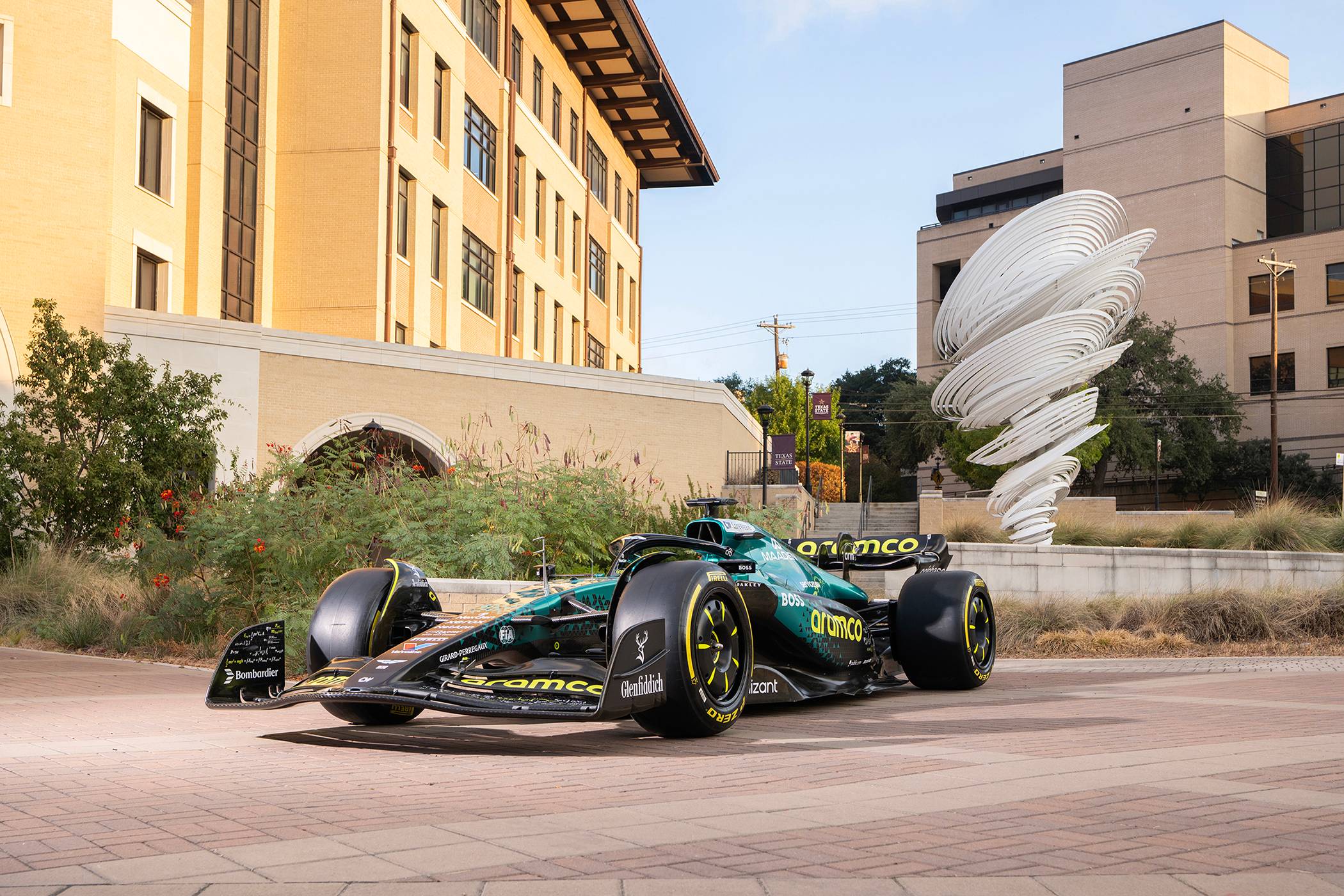 formula 1 race car in front of txst engineering building