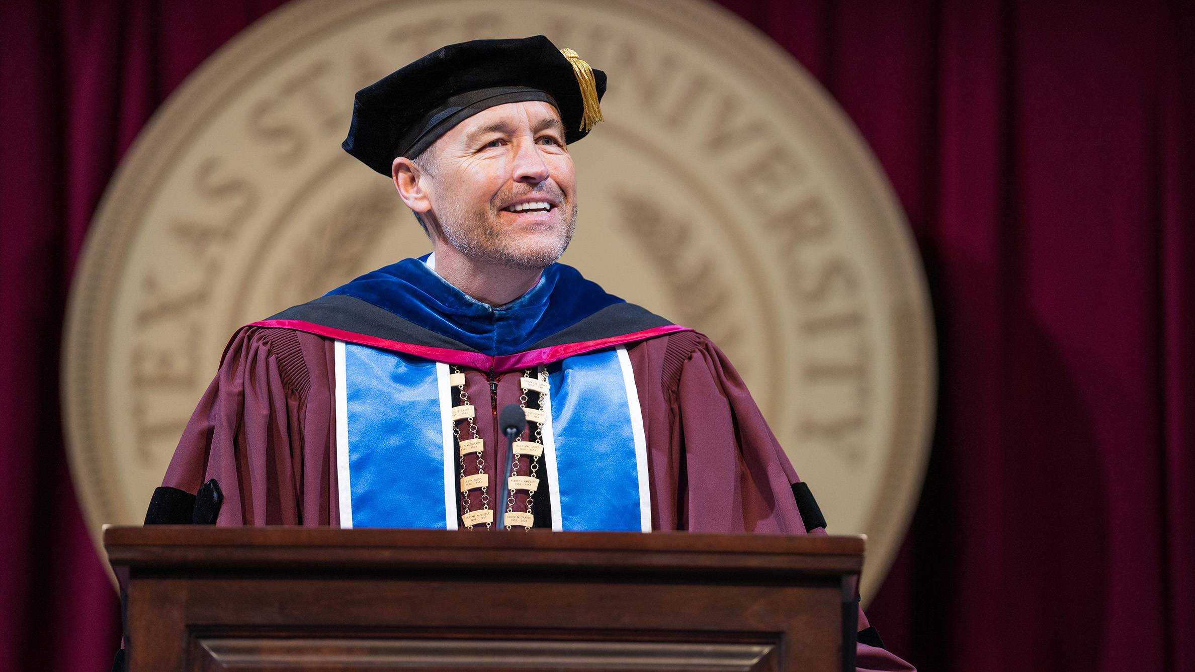 President Kelly Damphousse speaks at the winter commencement.