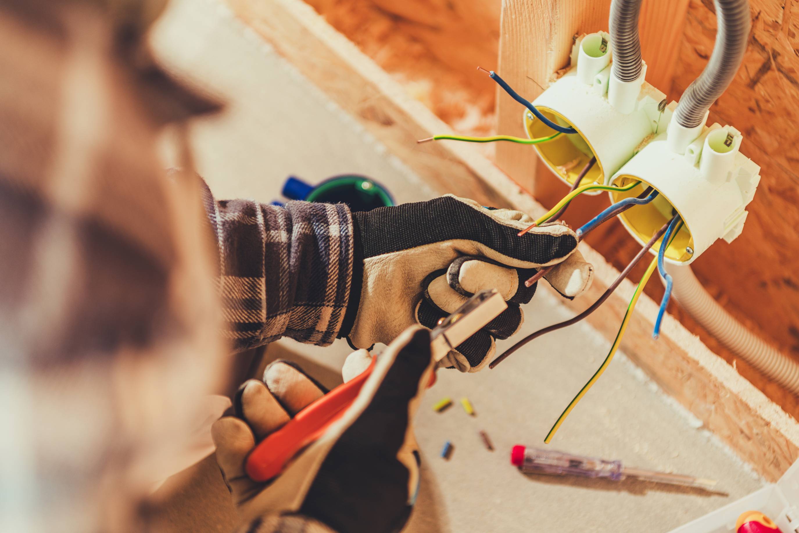 an electrician working on wires