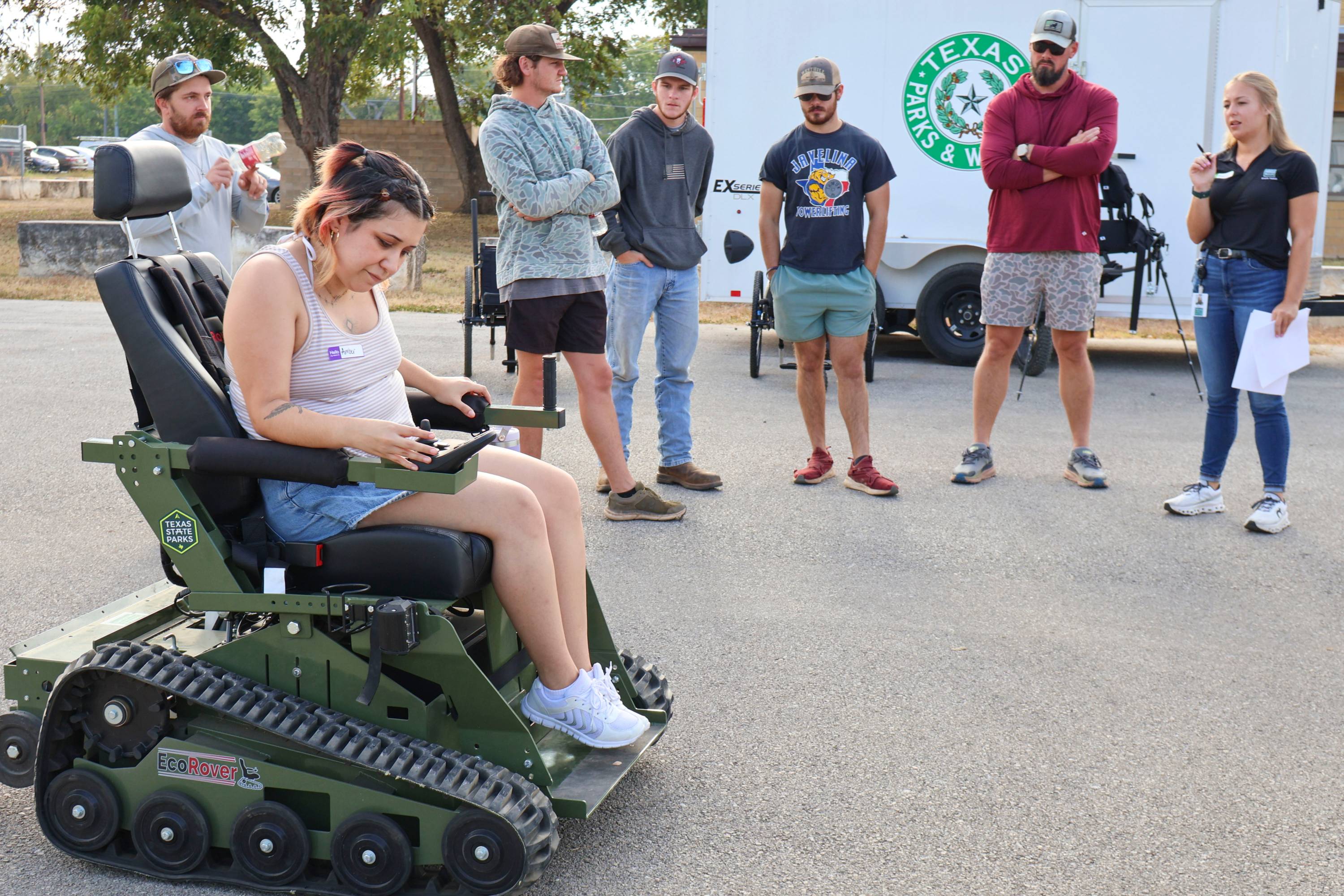 woman in a trail-access wheelchair