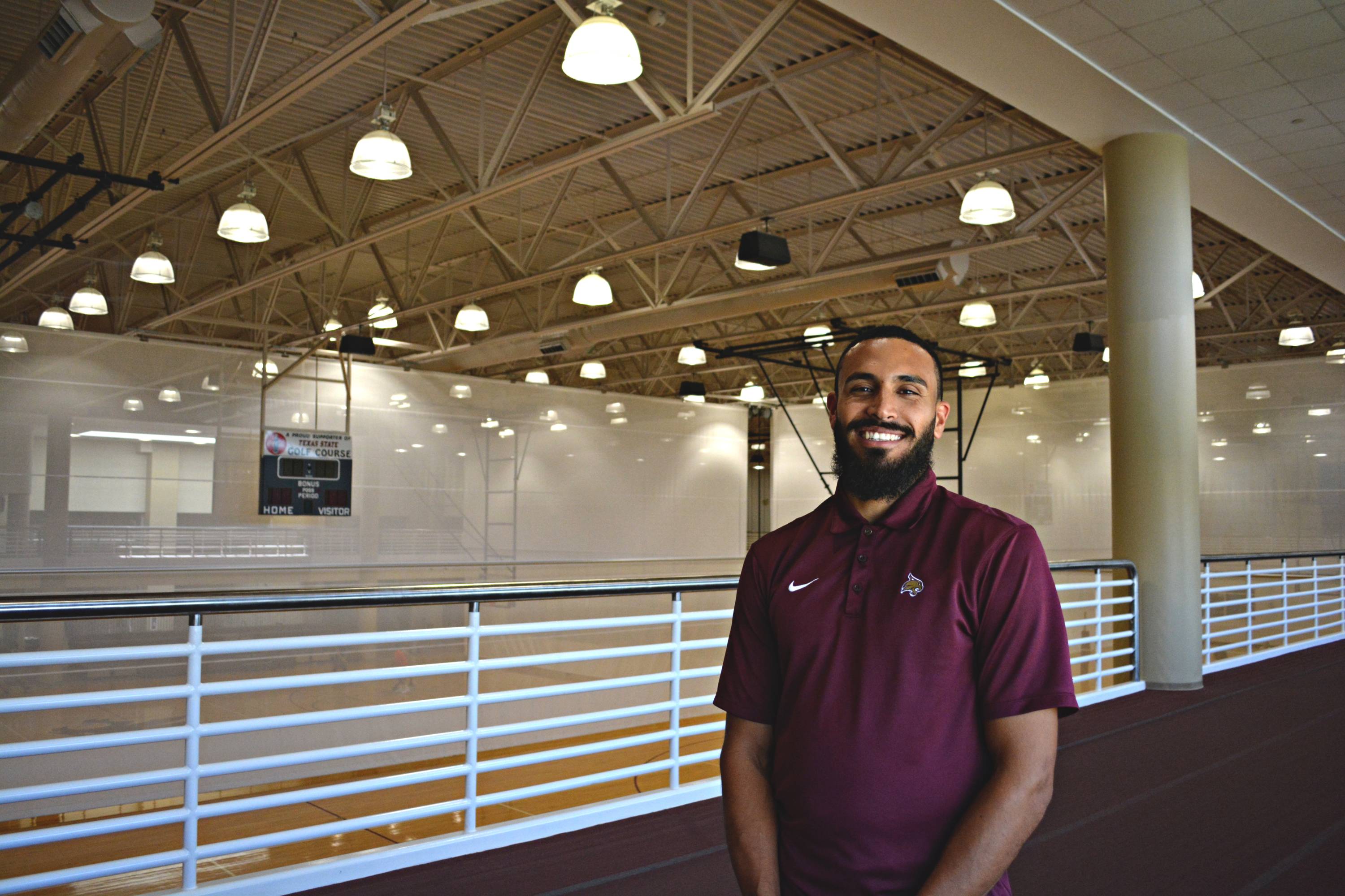 man standing infront of LED lighting smiling