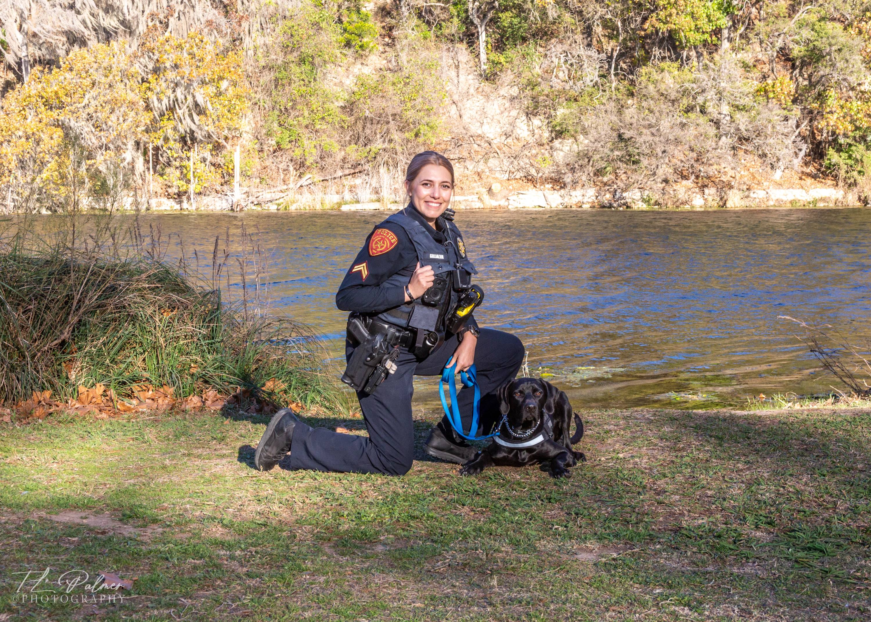 Cpl Grijalva and Baloo by the water