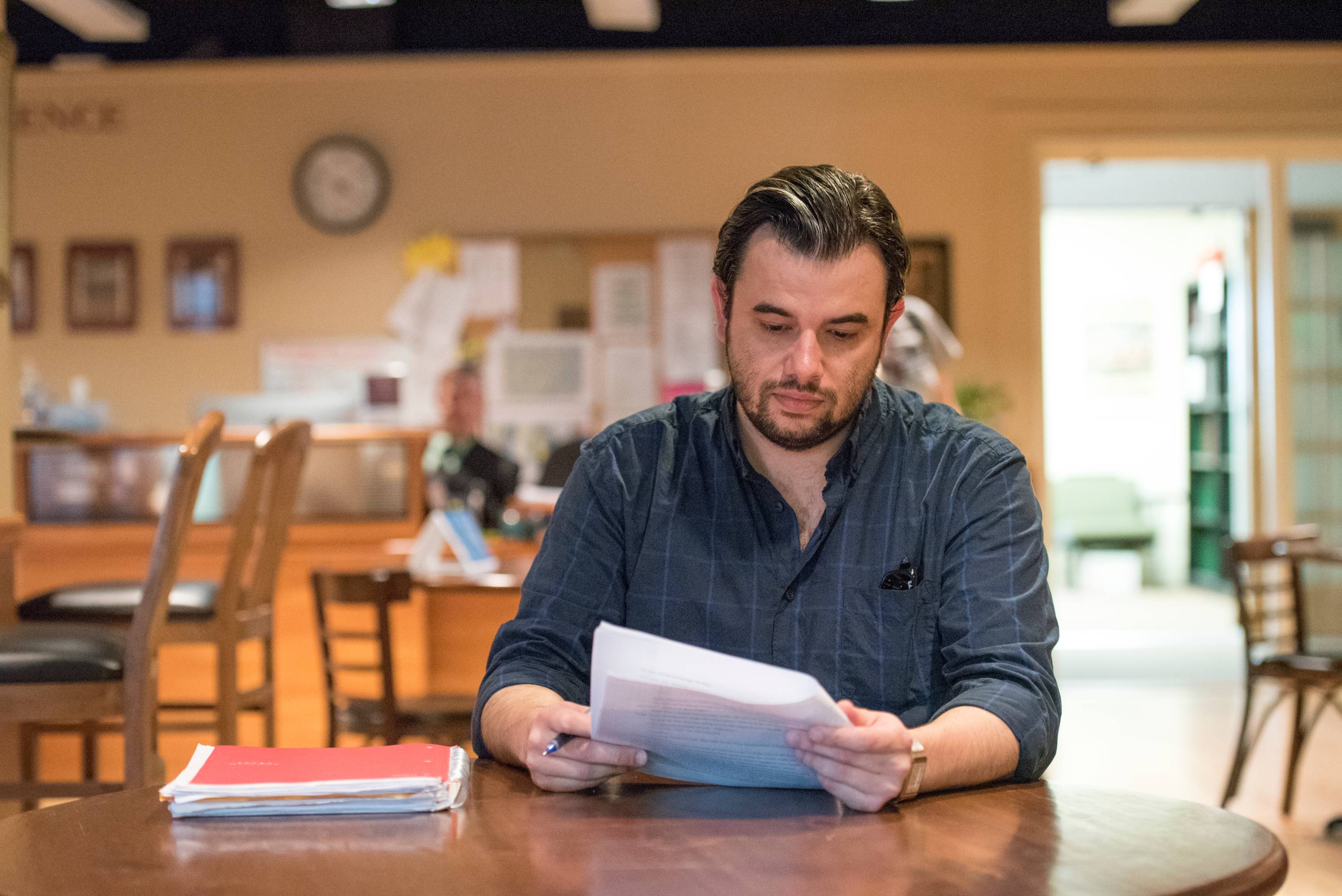 A man reviews a document.