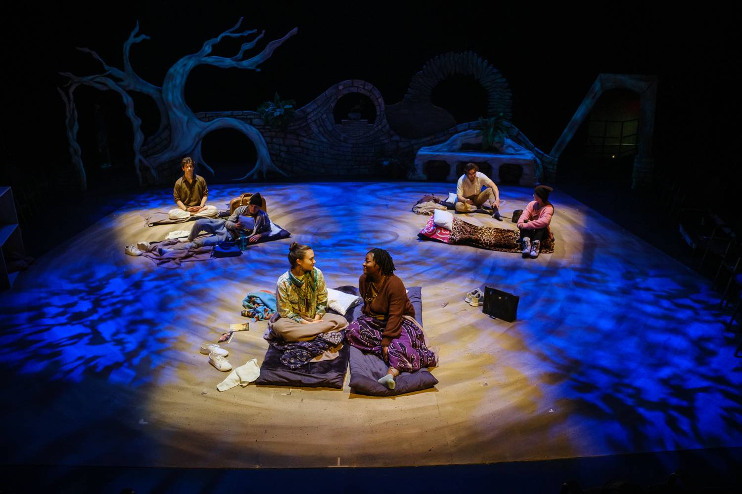 students performing small mouth sounds, a play in the theater department