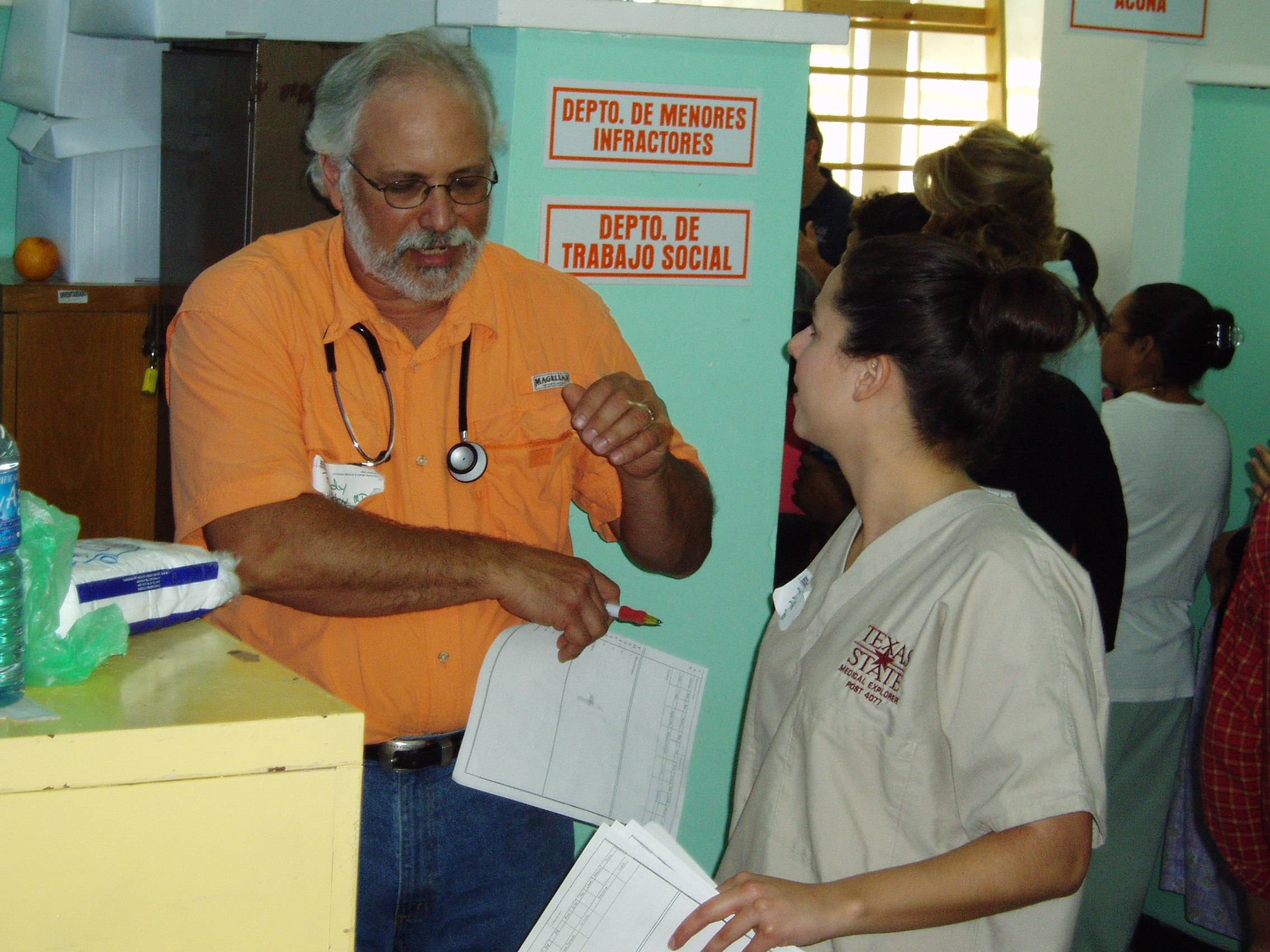 Medical Explorer discussing a patient with physician