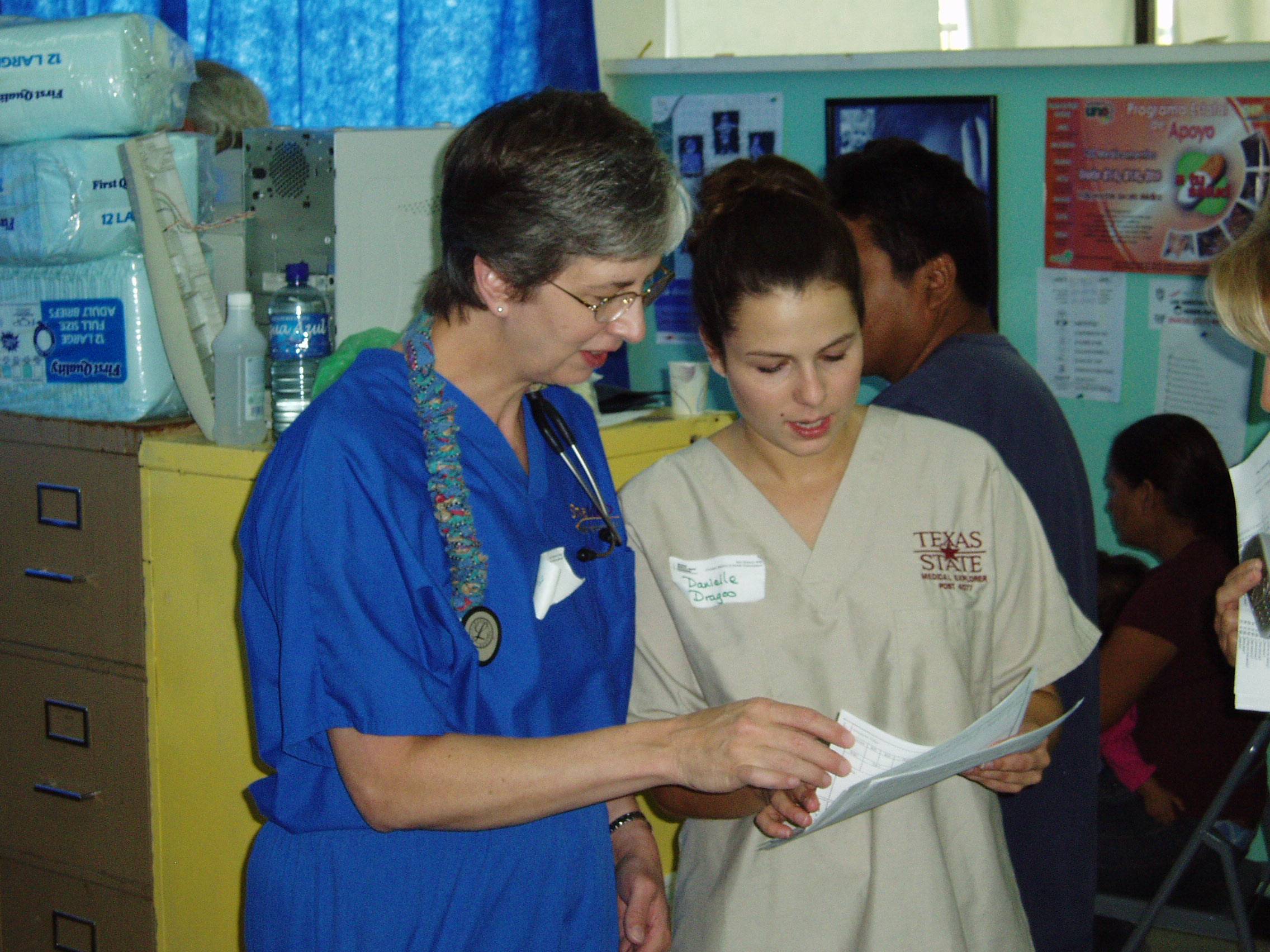 Medical Explorers discussing a case with a physician