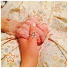 Medical Explorer holding the hand of a patient