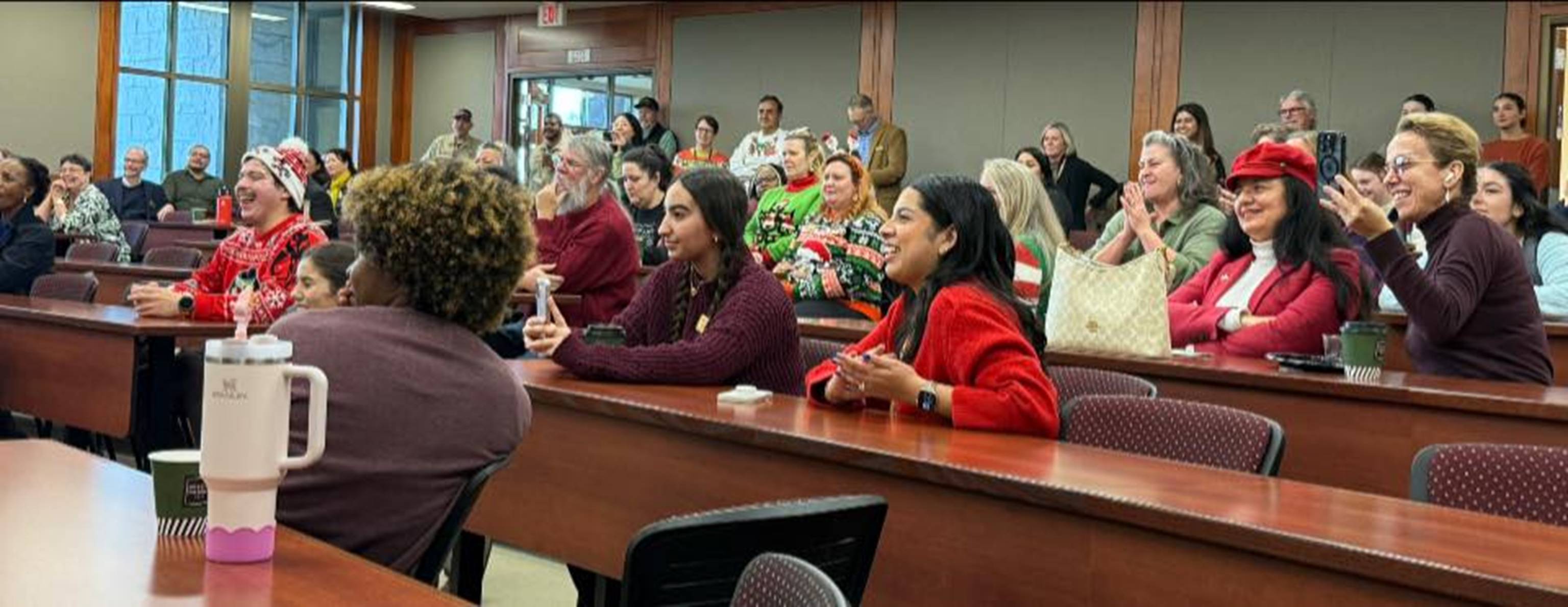 Guests watching the stage.