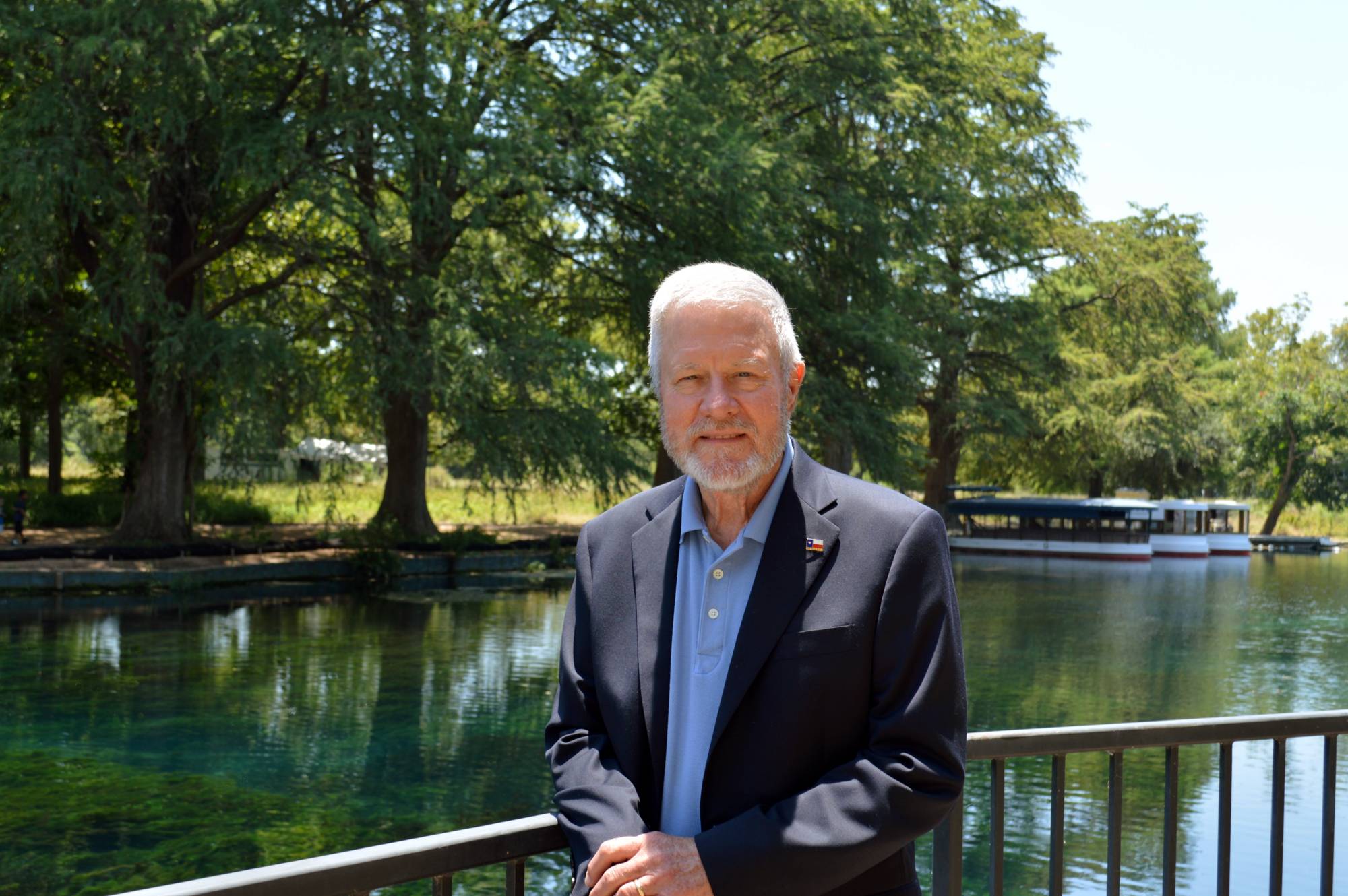 andrew sansom standing outside of meadows center