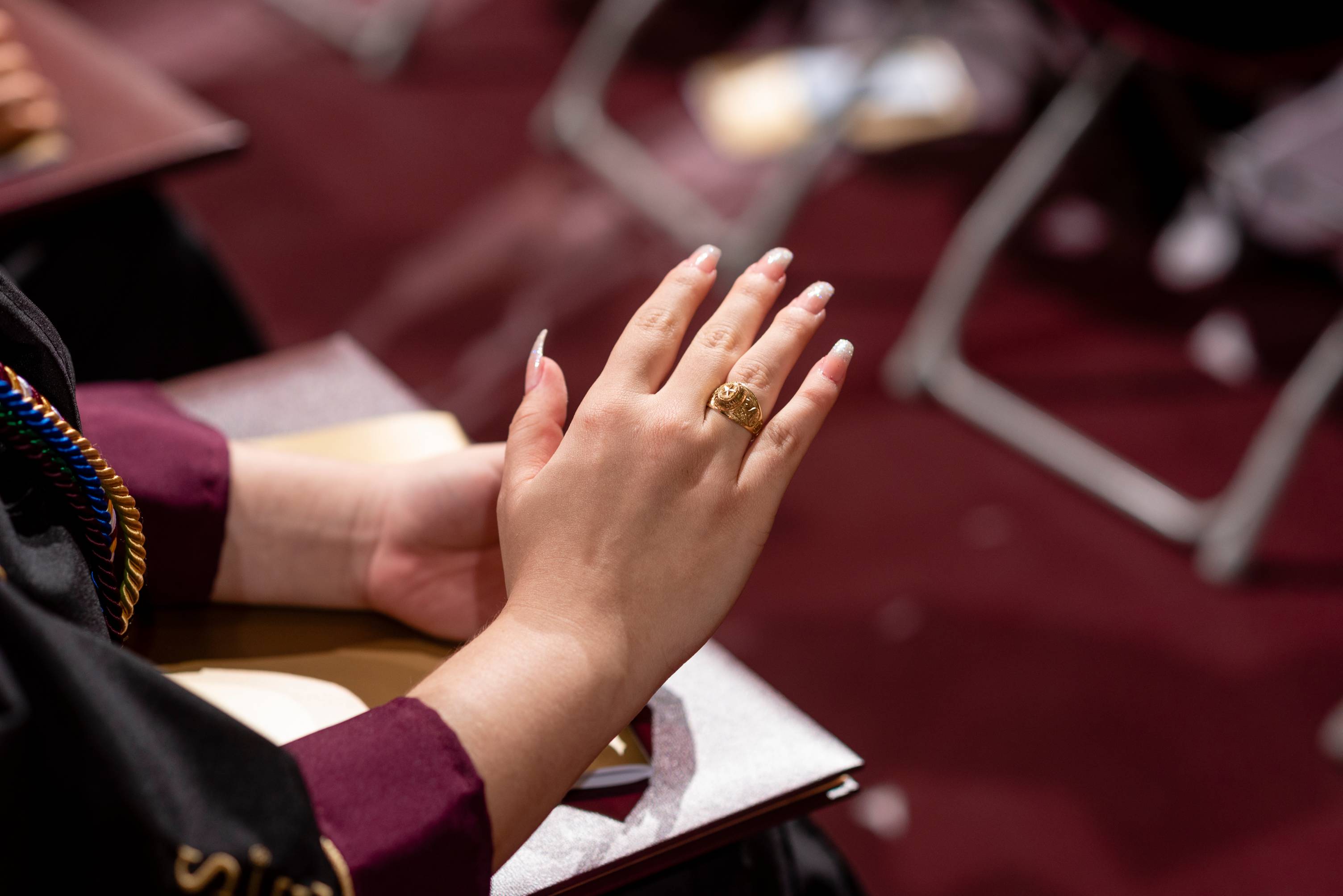 A grad looks at their TXST ring