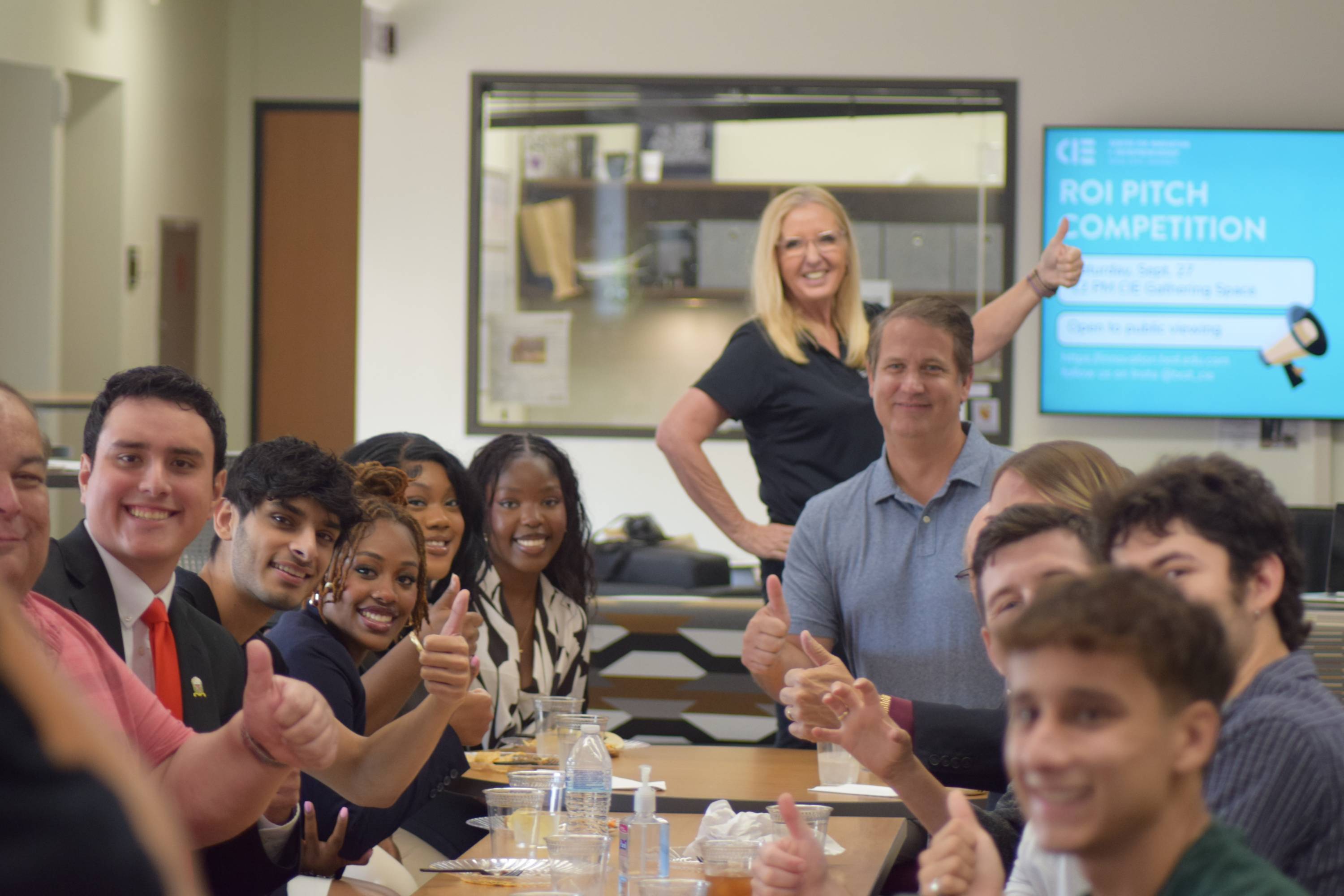 Crowd filling up teaching theatre for CIE event 