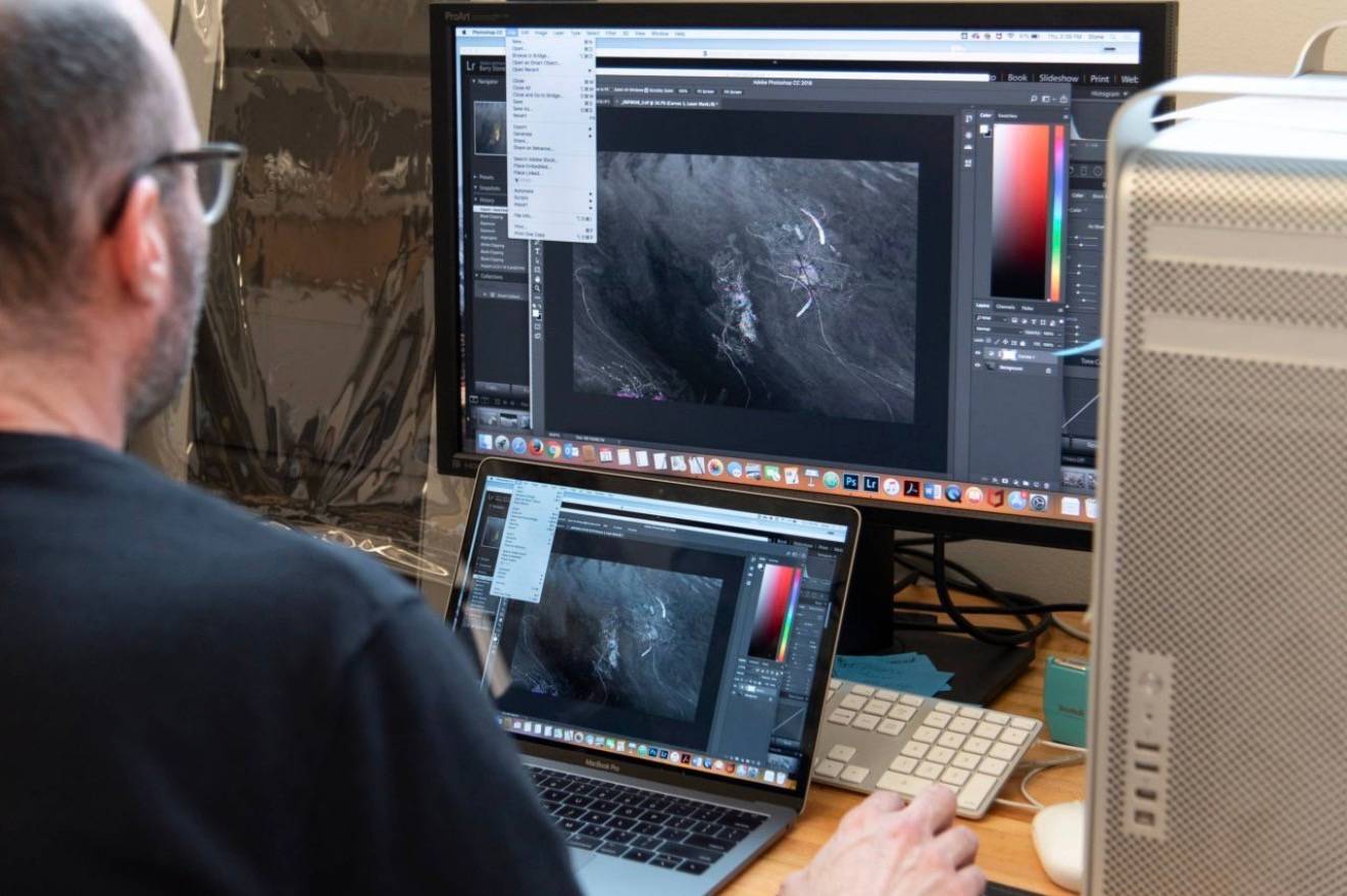 Graphic Design student at a computer