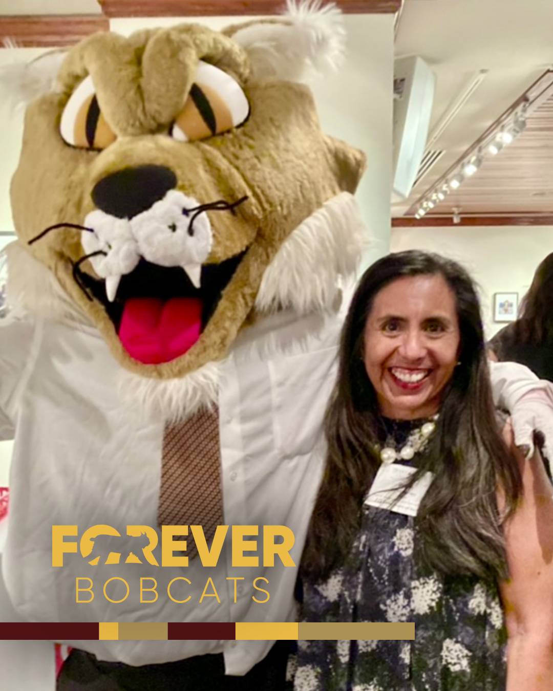Sylvia with Boko the Bobcat and a Forever Bobcat logo