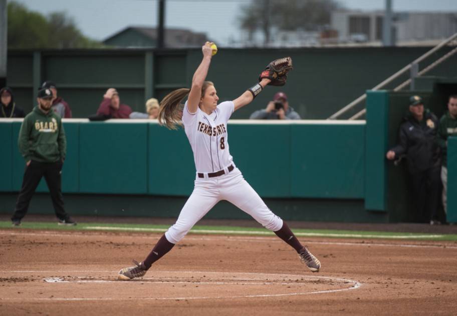 Softball Player Throwing a Pitch