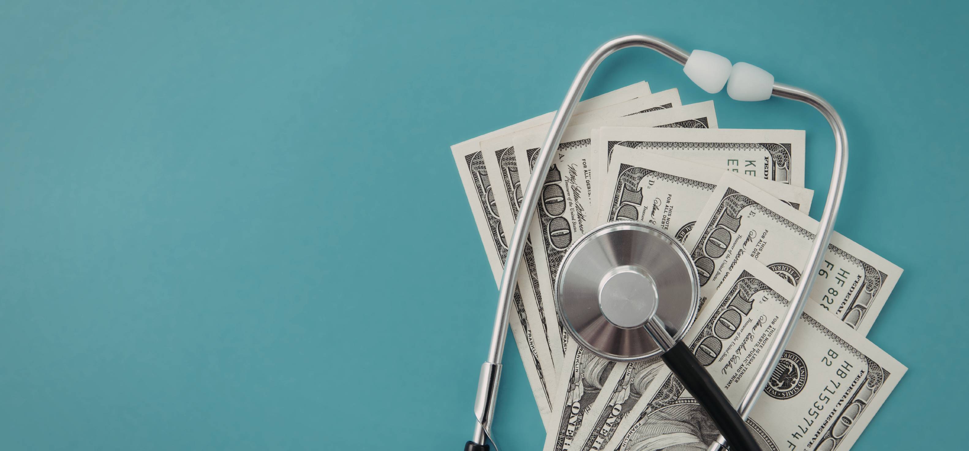 money under a stethoscope