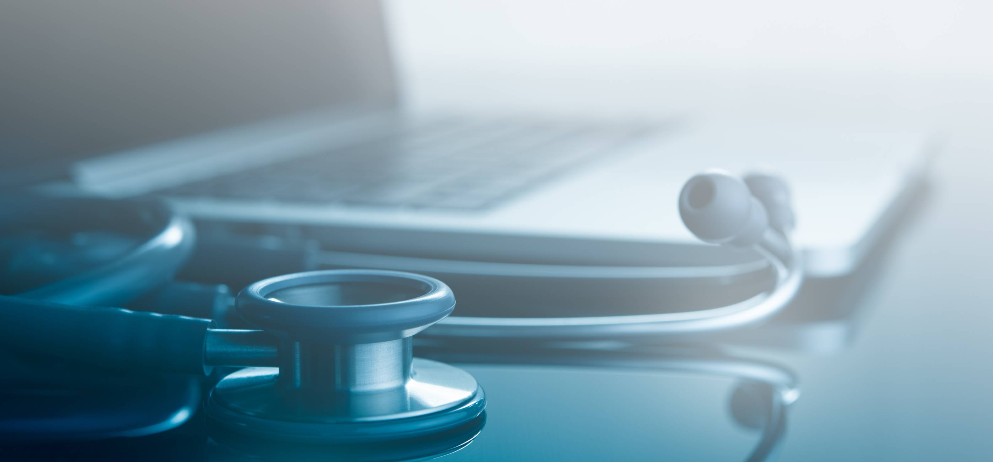 stethoscope near macbook