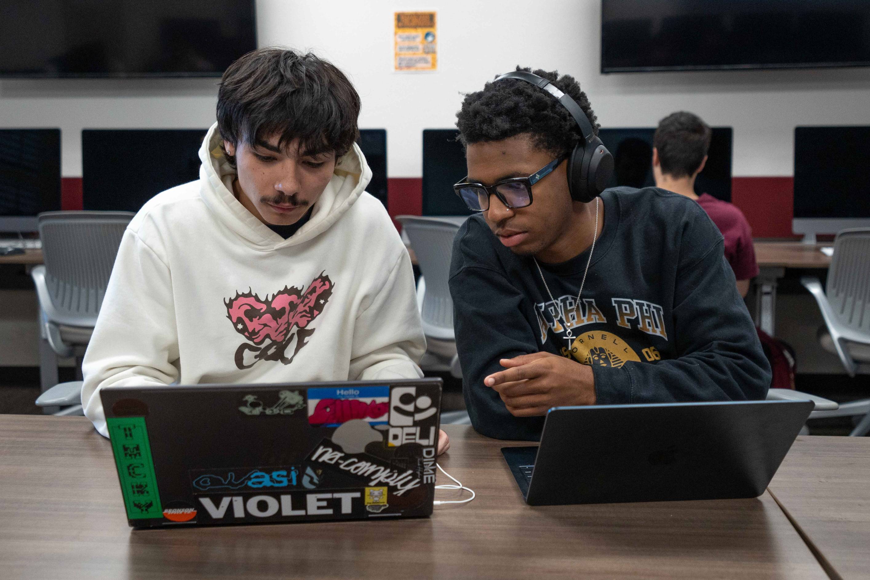 Students working together on their computer