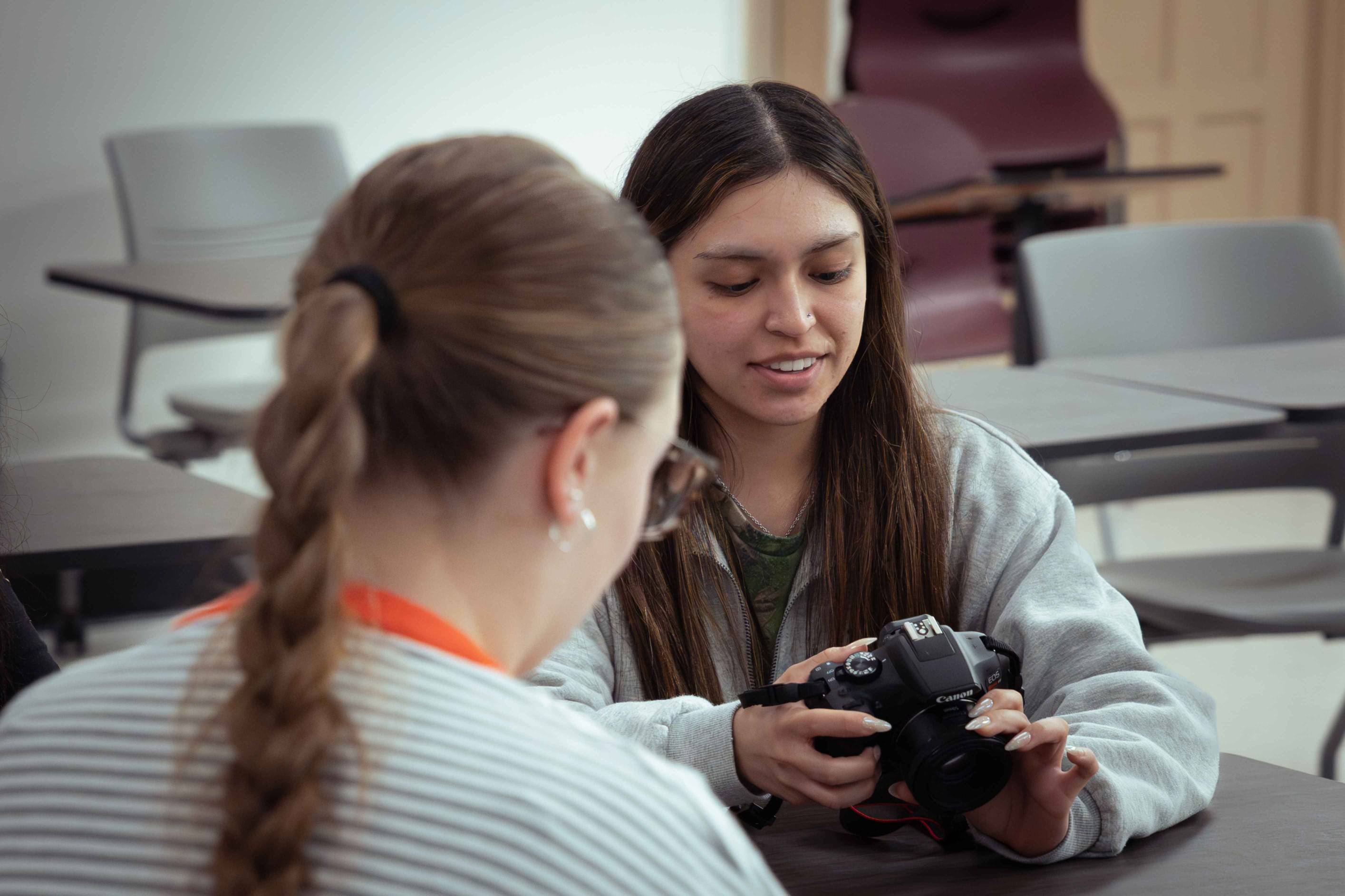 Photo of student using camera