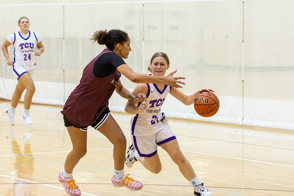 texas state women's basketball player guarding a player from a rival school at nirsa regional basketball tournament 