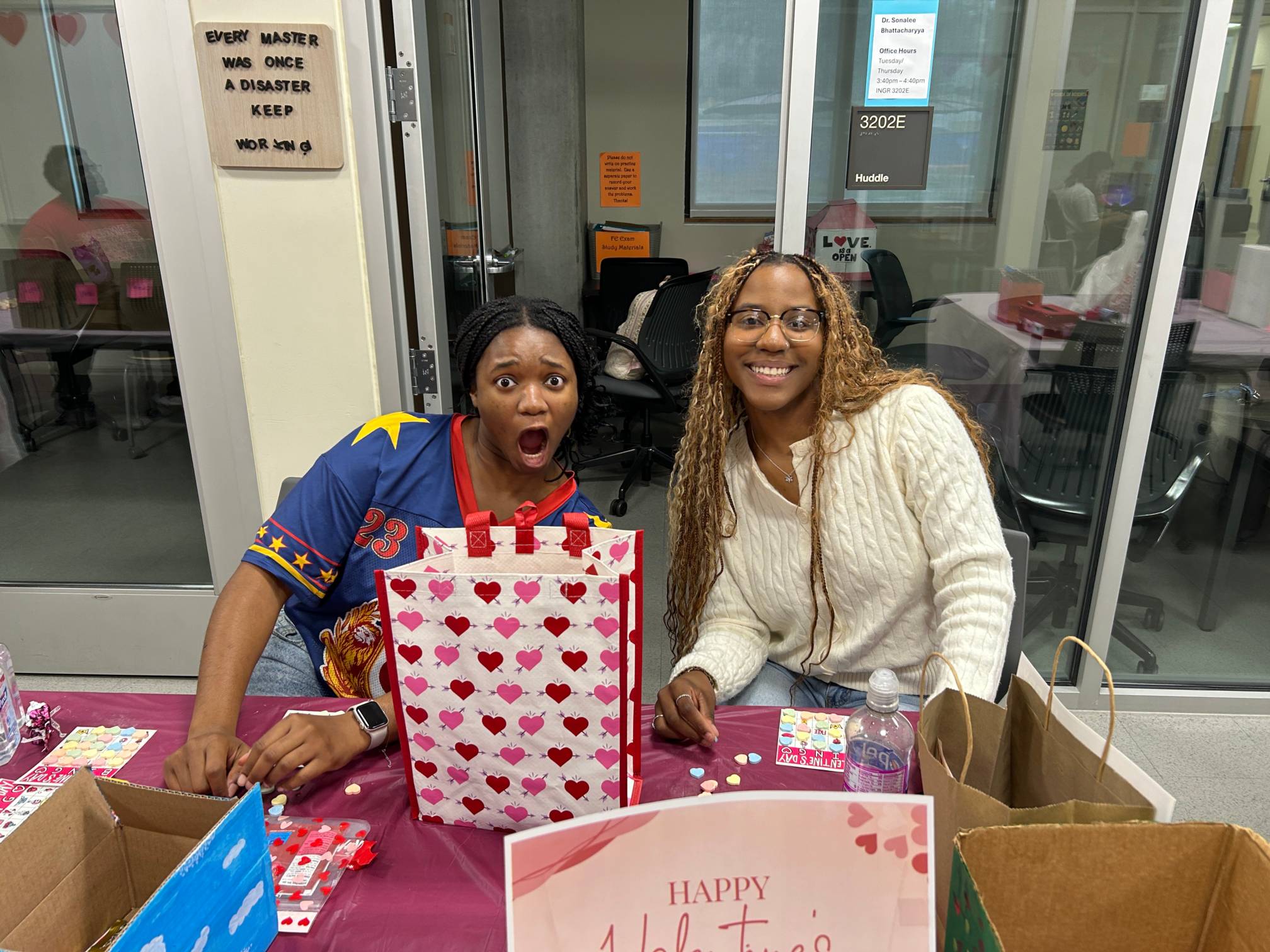 Two girls sitting at a table