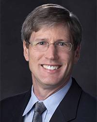 Headshot of Christopher Rhodes.