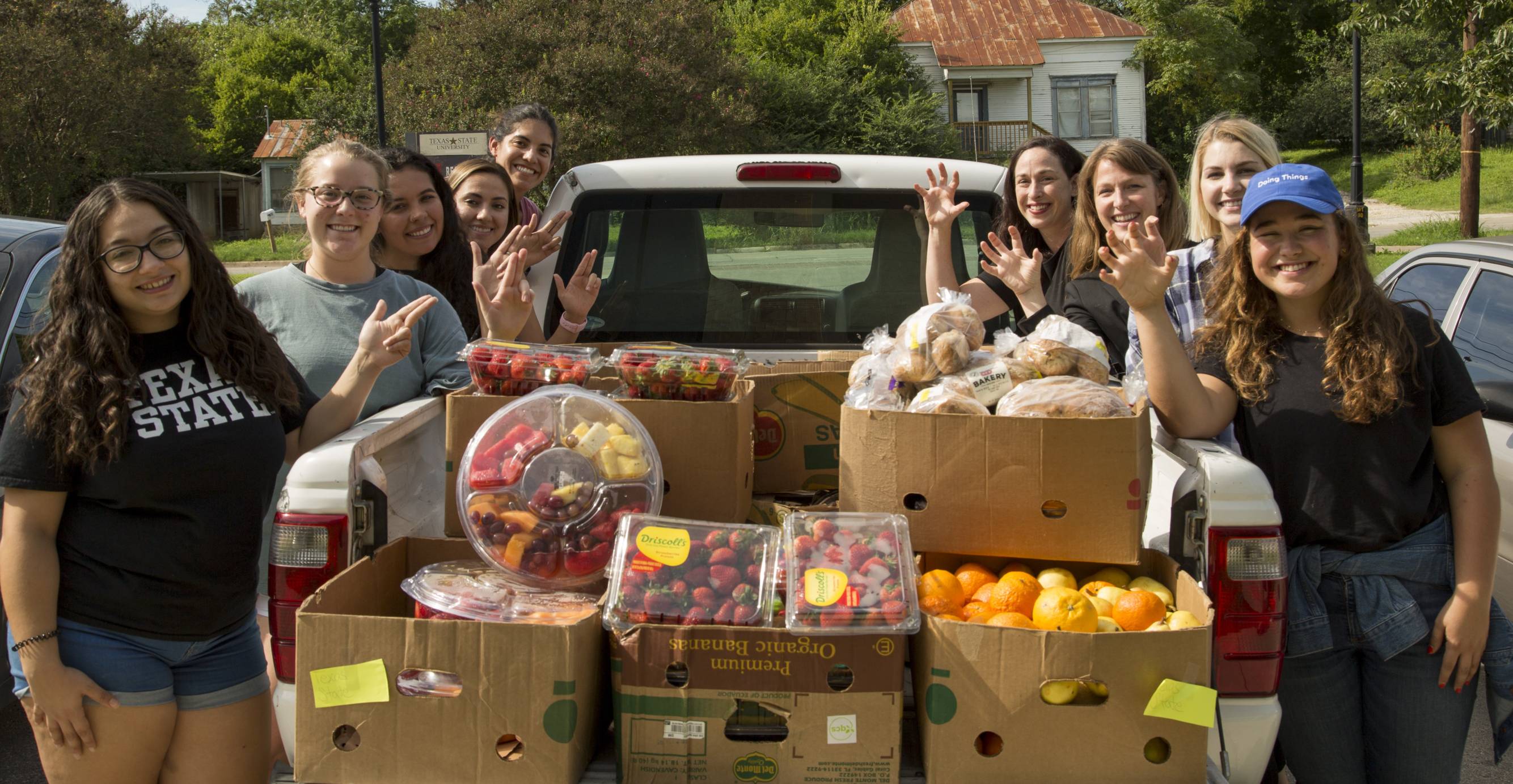 nutrition students with a truckload of produce