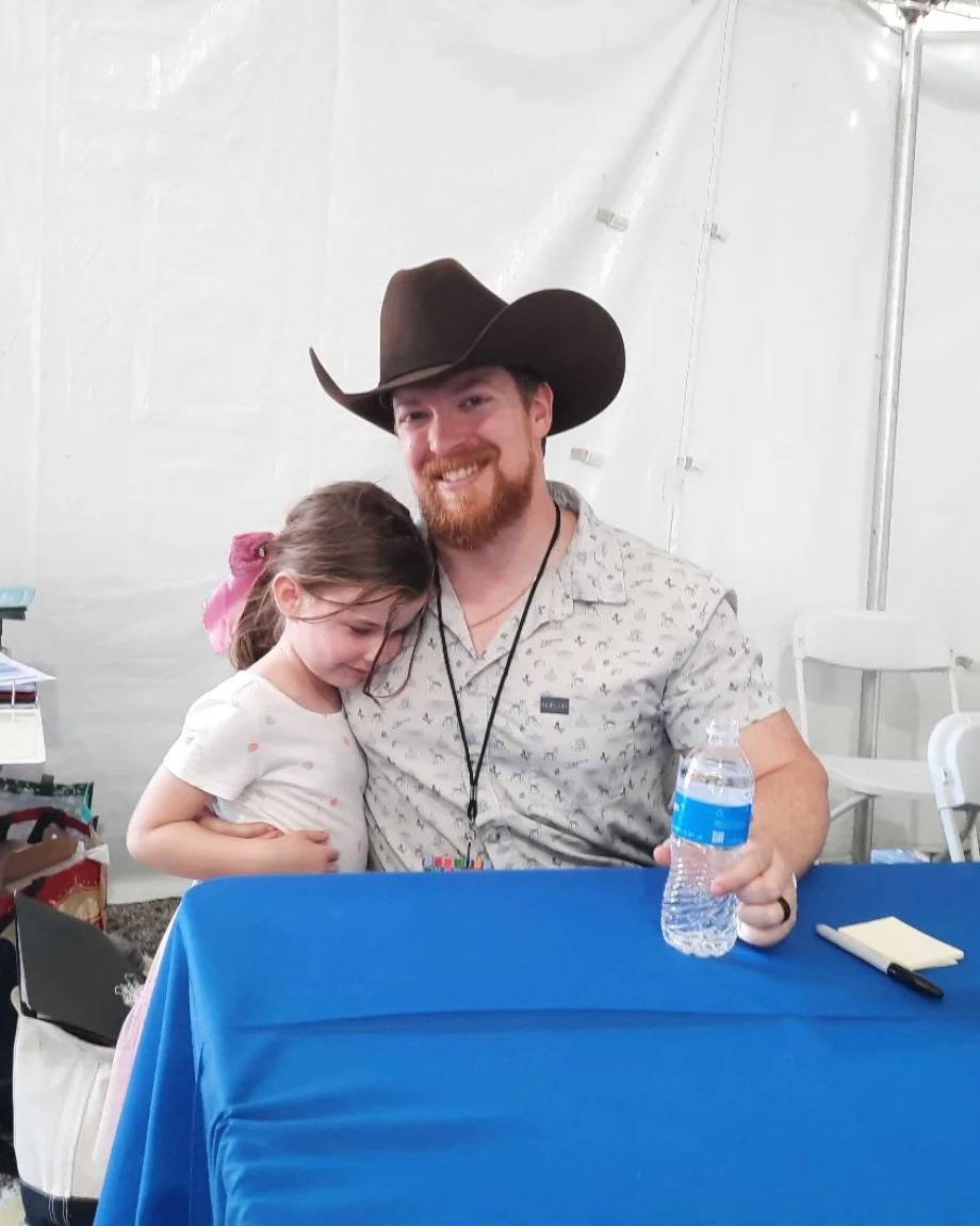 Wade and his daughter at the San Antonio Book Festival 2025. 
