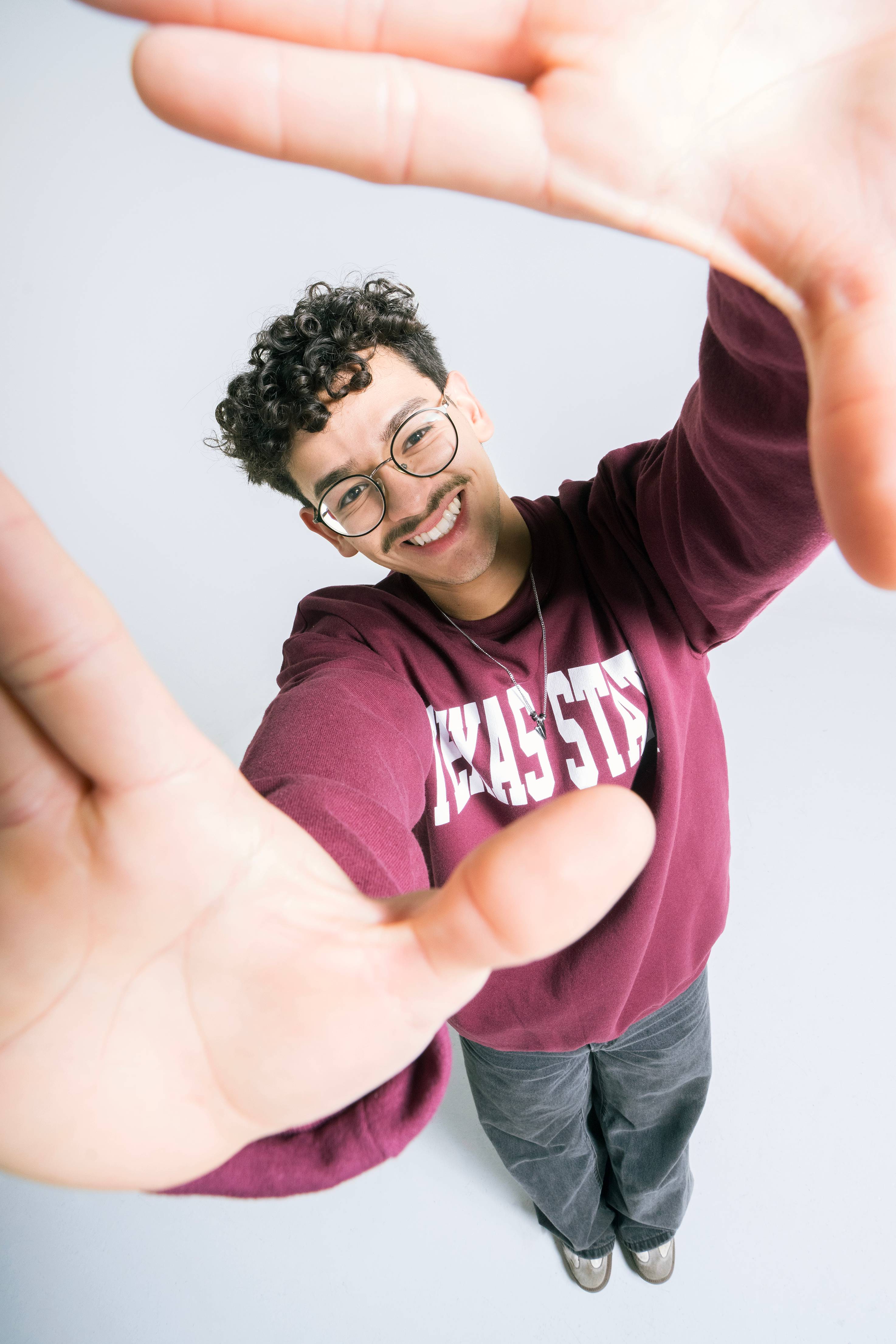 Joaquin Marquez holding his hands up to the camera