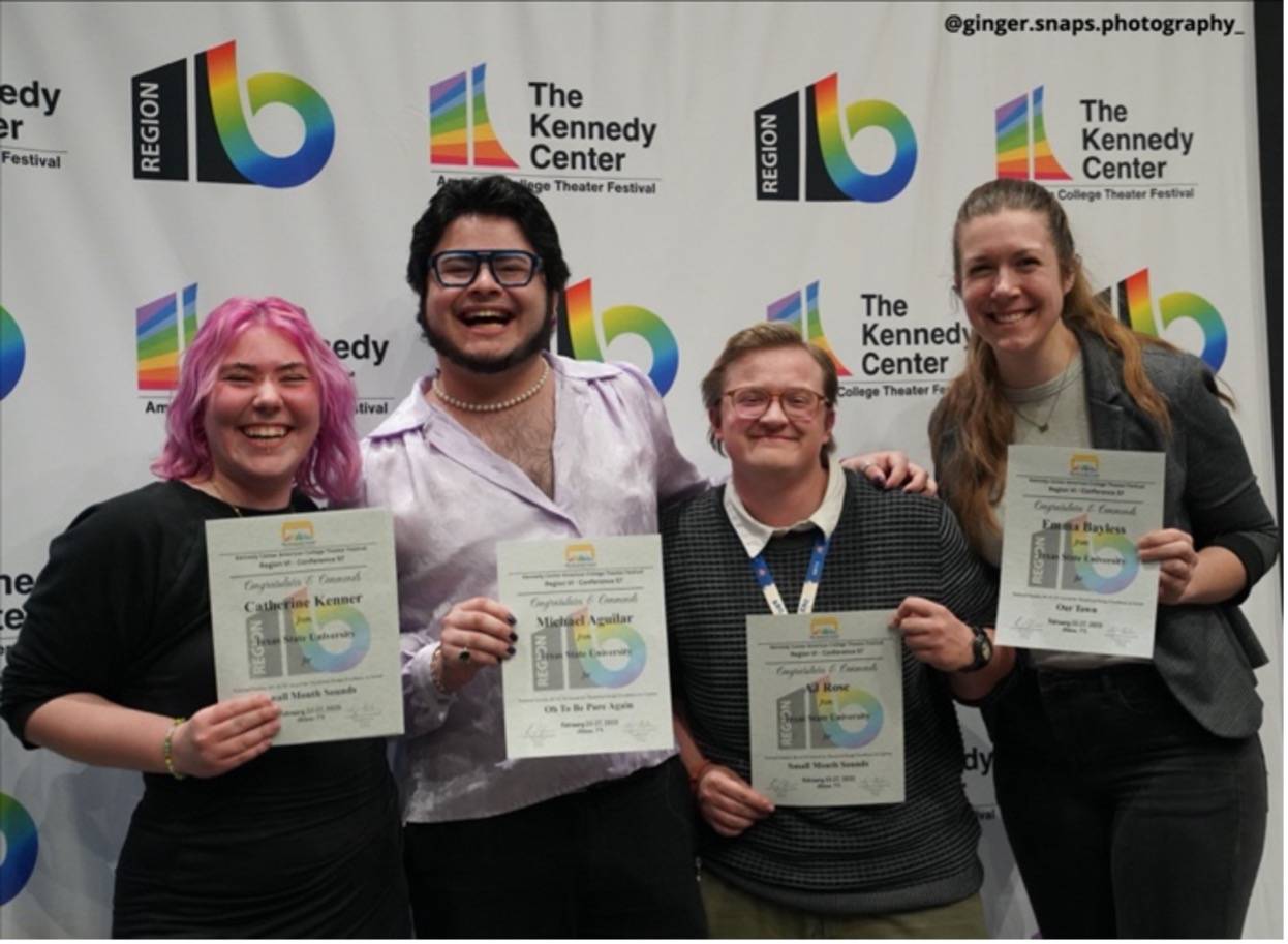 A group of theatre students with awards from the Kennedy center