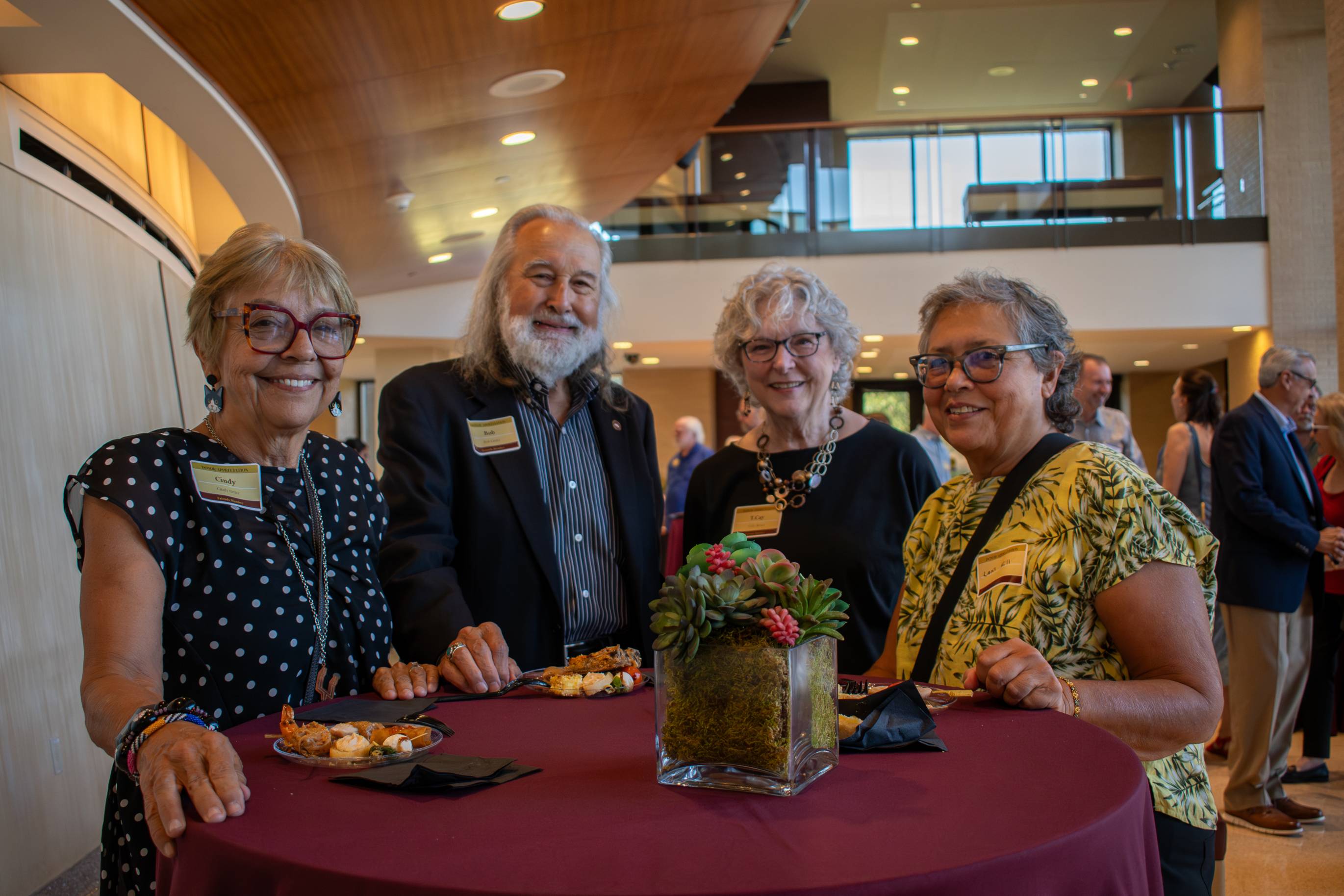 friends members posing for a photo at donor appreciation event