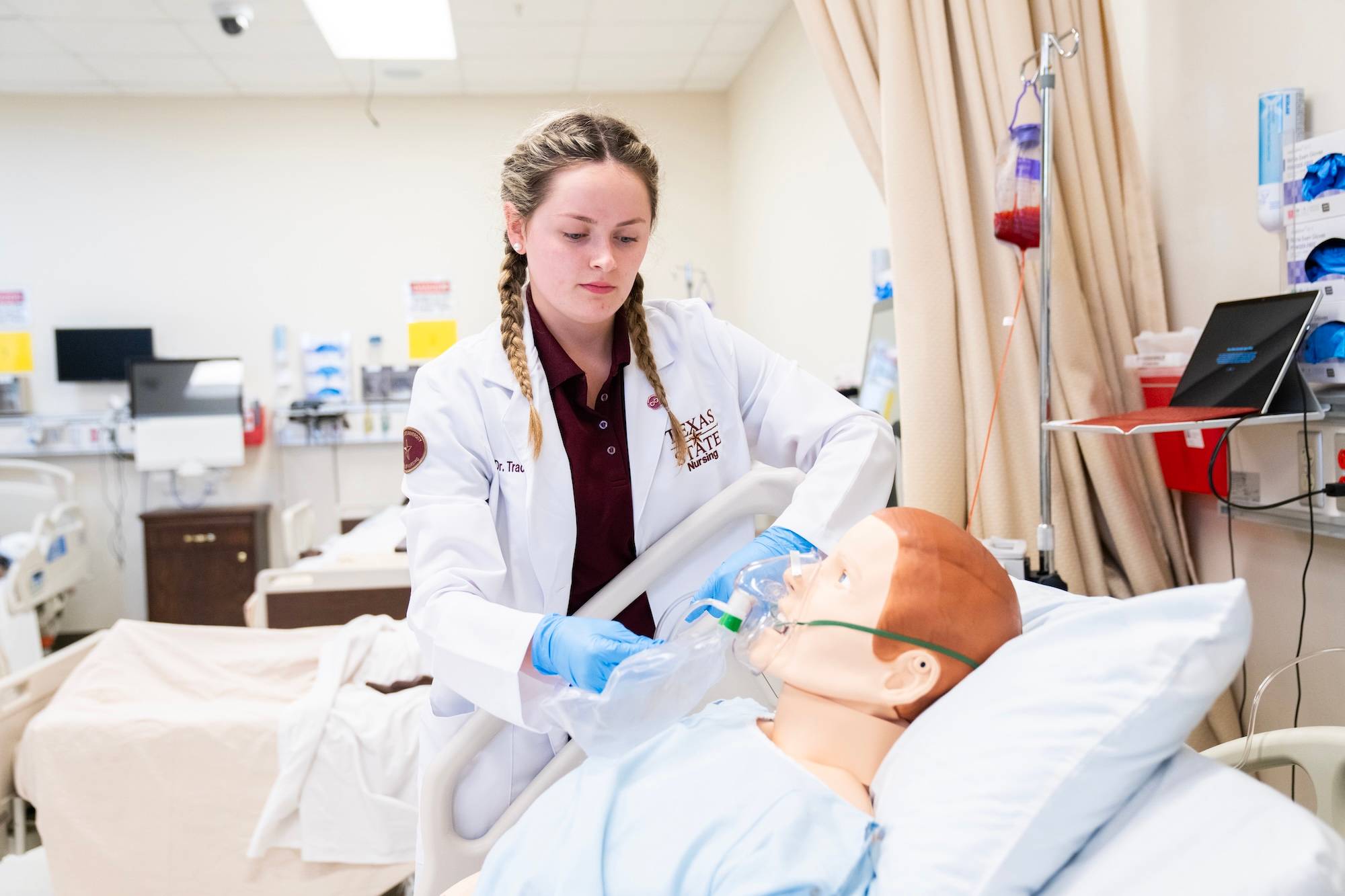 Texas State nursing student working on an assignment