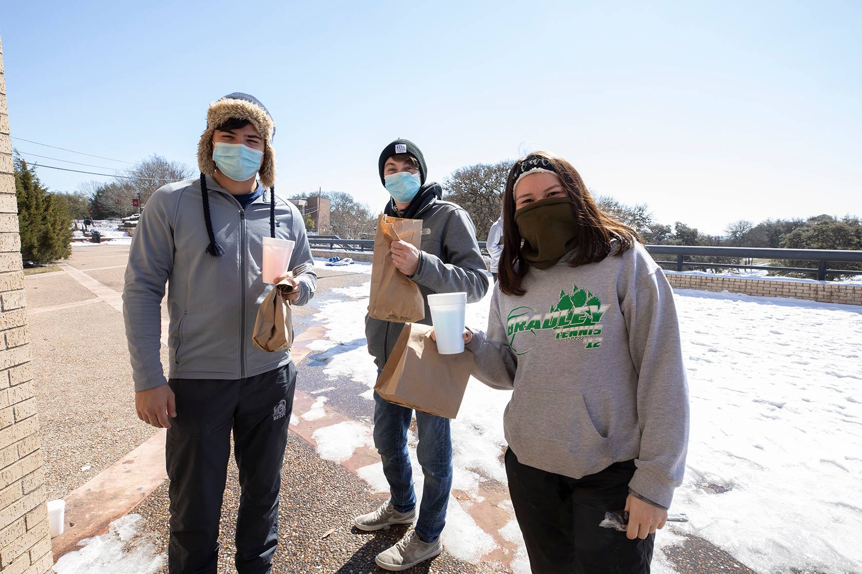 Texas State students outside of a dining hall after the winter storm