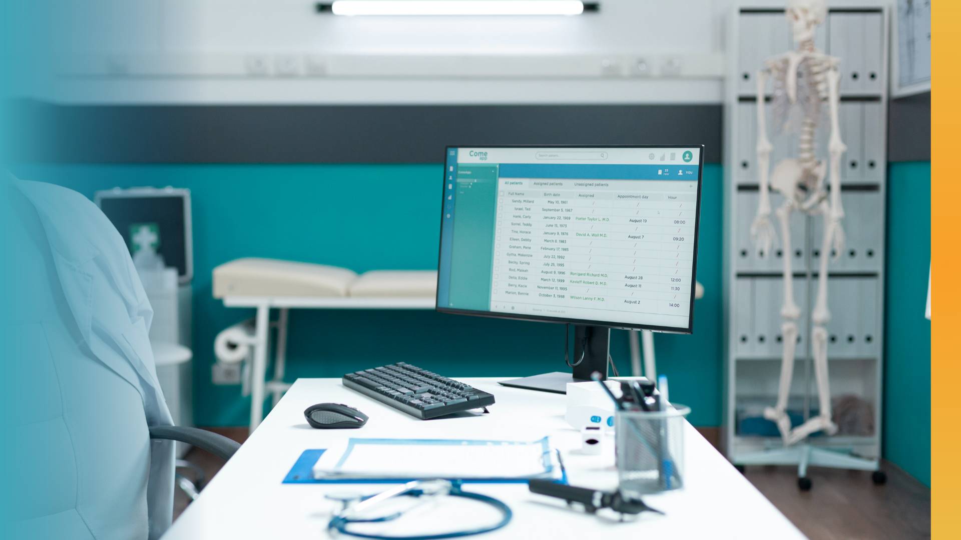 A desk with a desktop monitor display medical information. A chair with a lab coat is to the left of the desk.