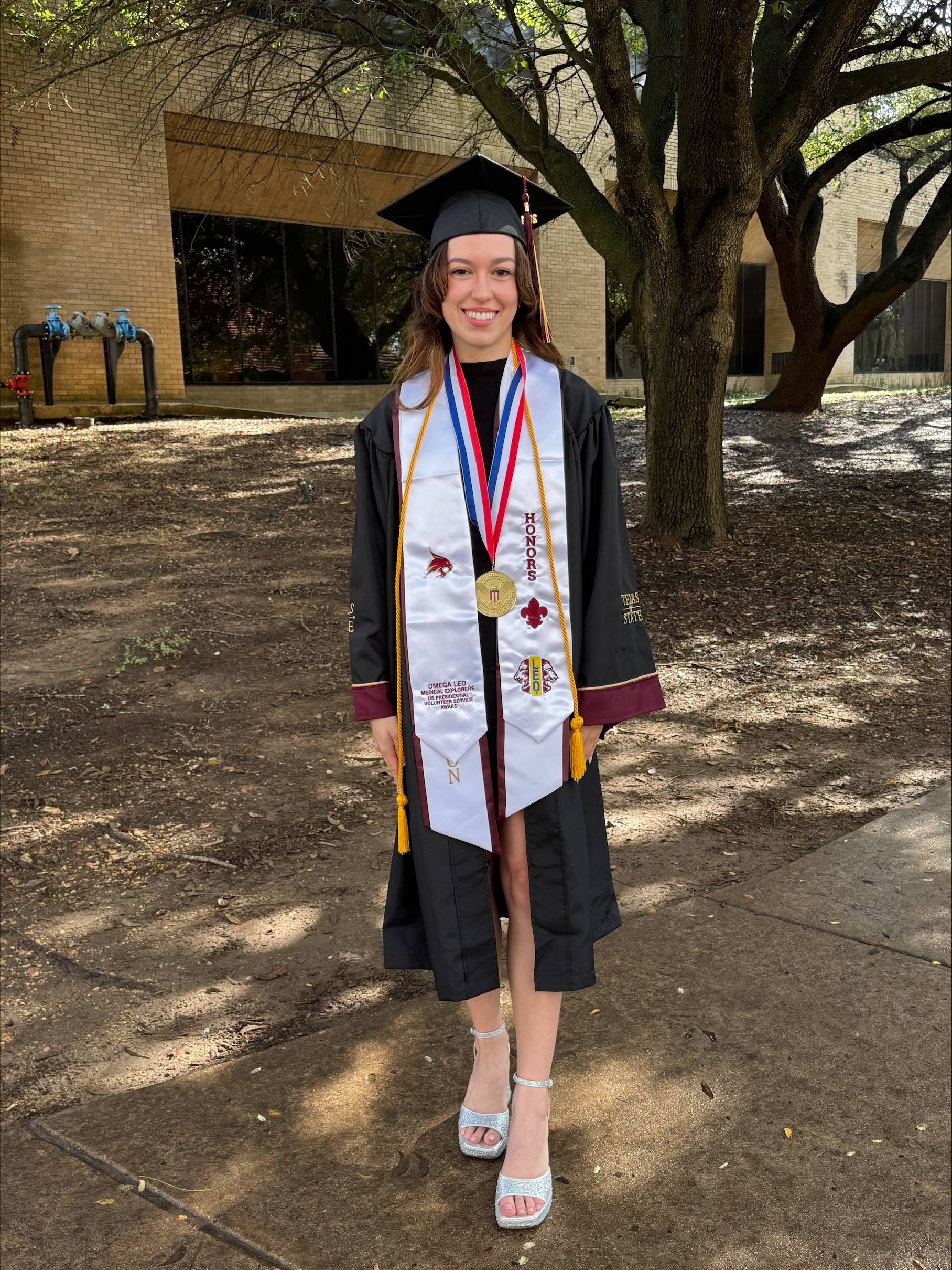 Medical Explorer honors graduate with the US Presidential Volunteer Service Award