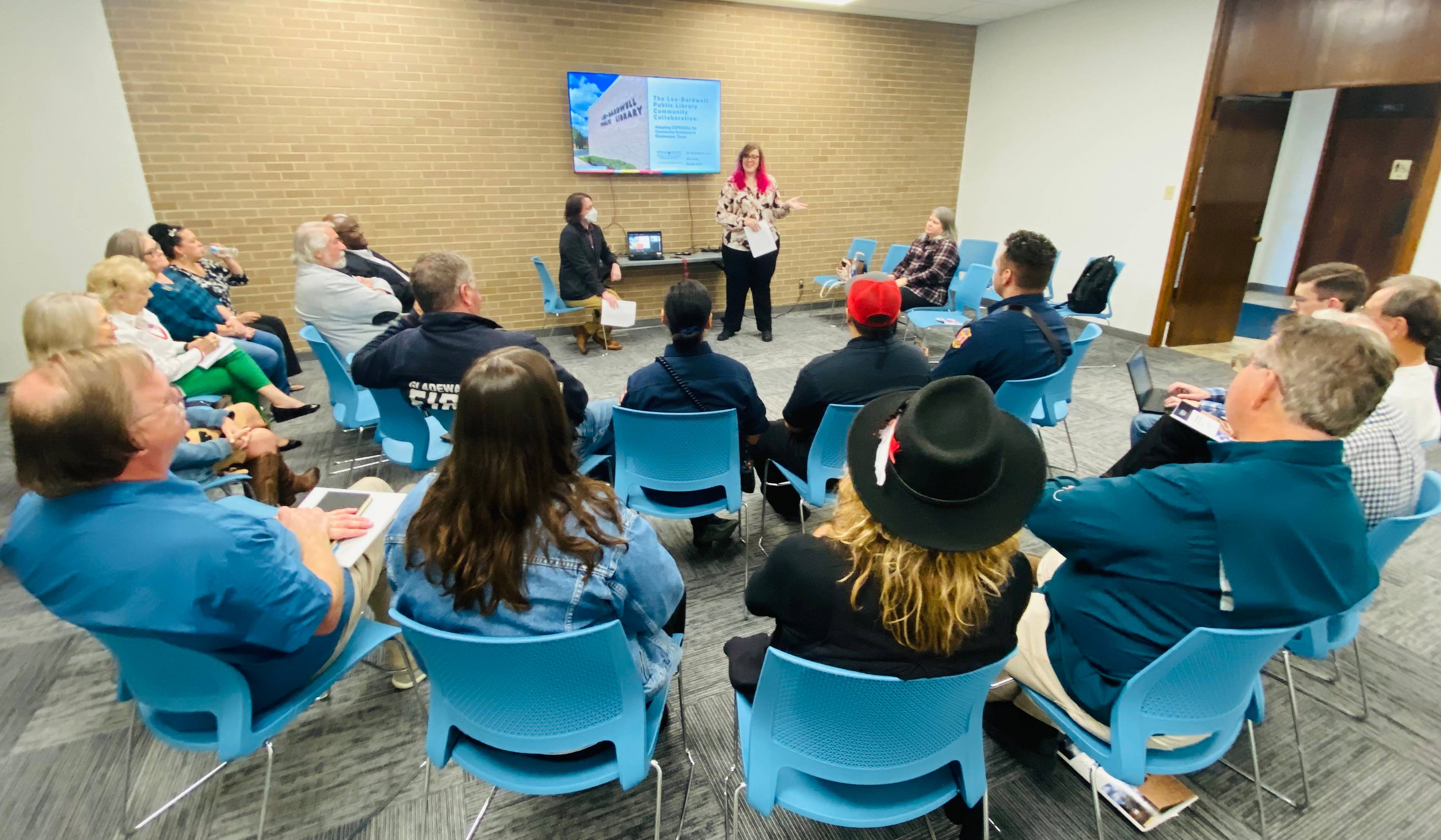 Dr. Elizabeth K. Eger and Rex Long speaking at the Gladewater Library.