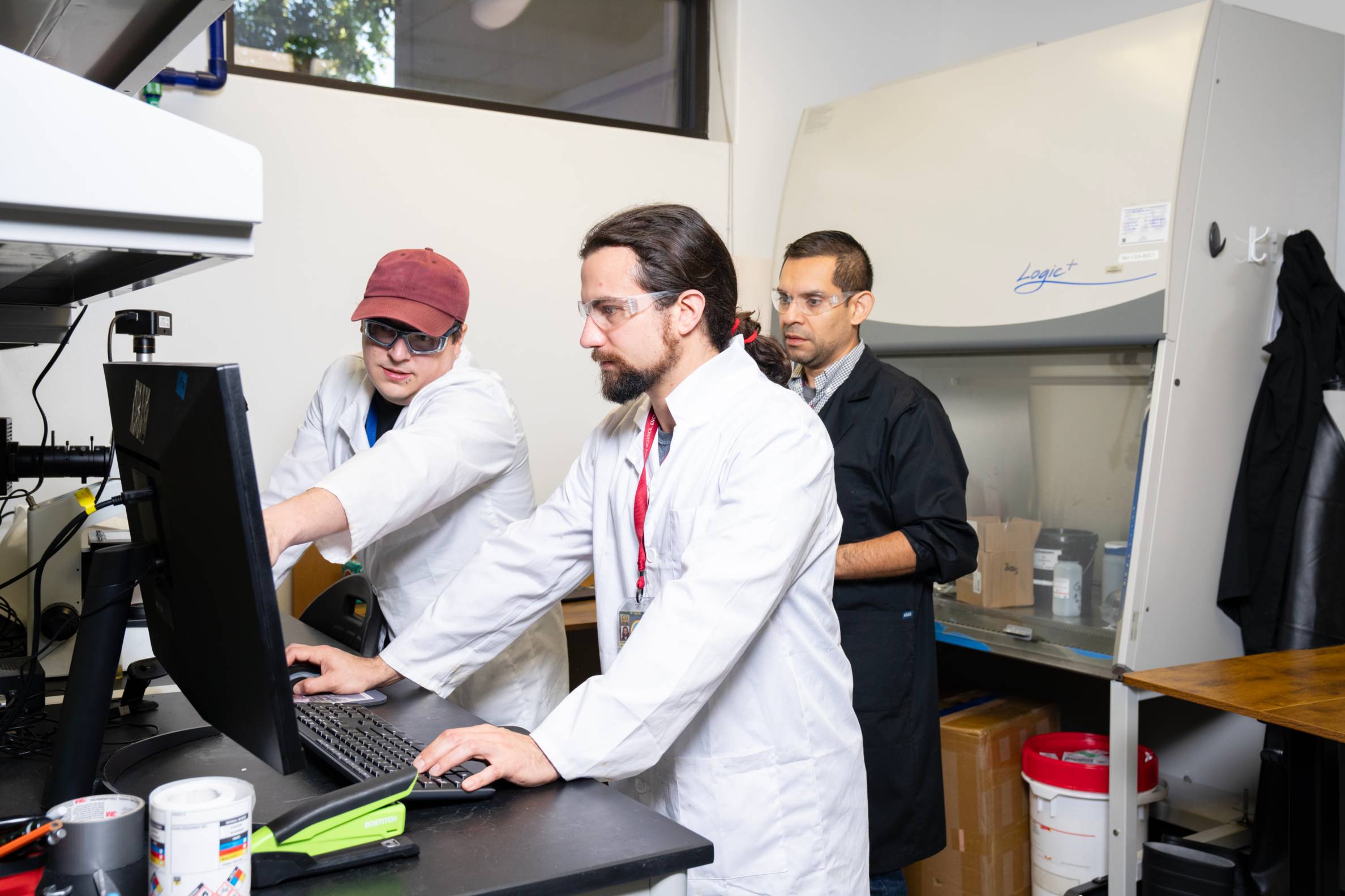 Researchers working together in a lab.
