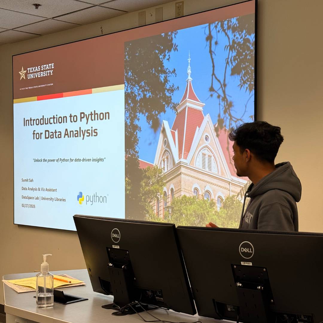 A graduate student leading a workshop