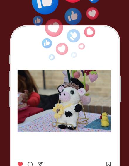 Phone with a crochet cow plush as an Instagram post.
