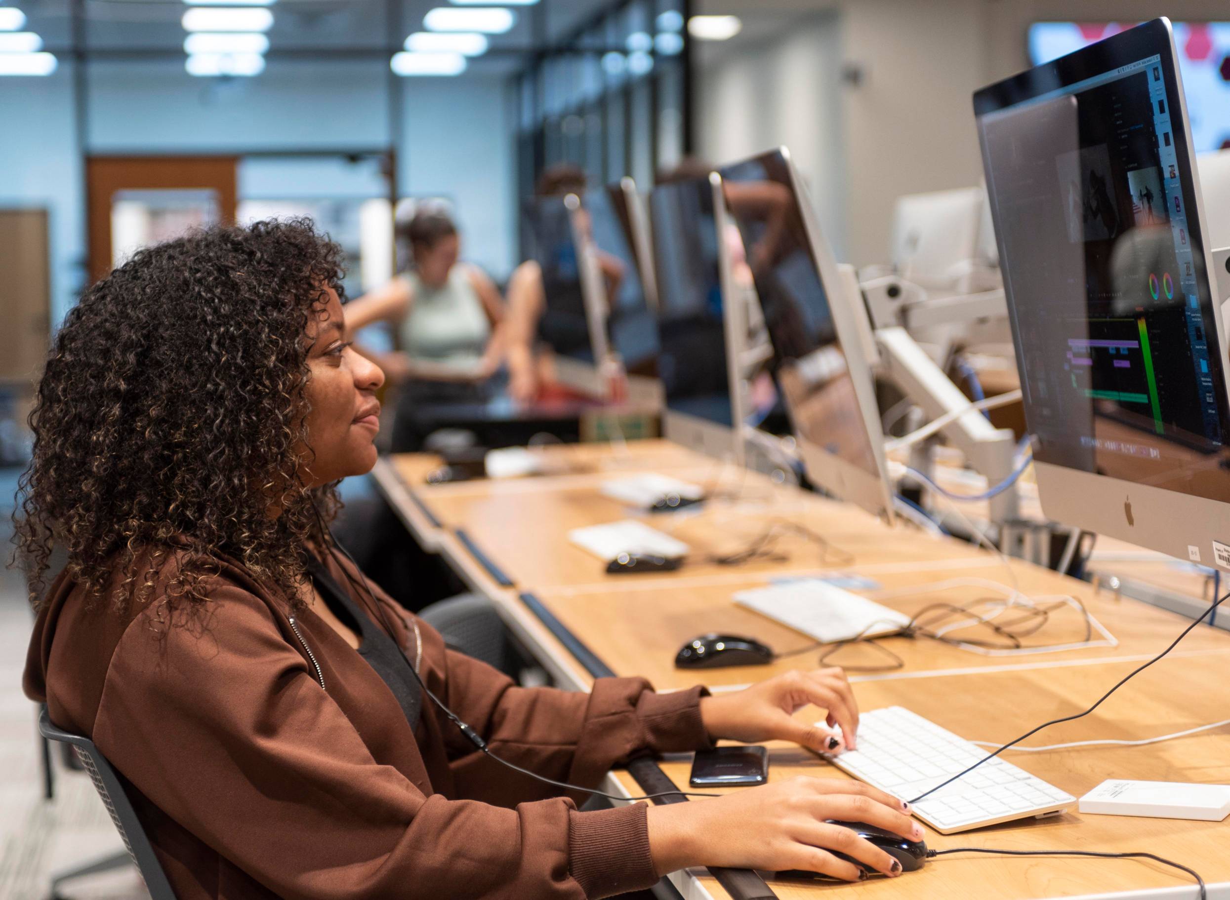 student working at a desk