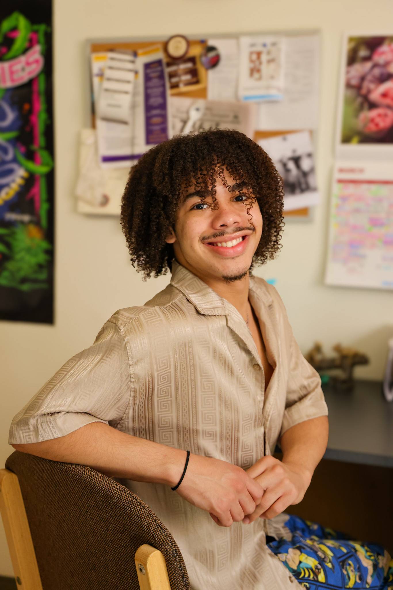 male student sitting at their desk 